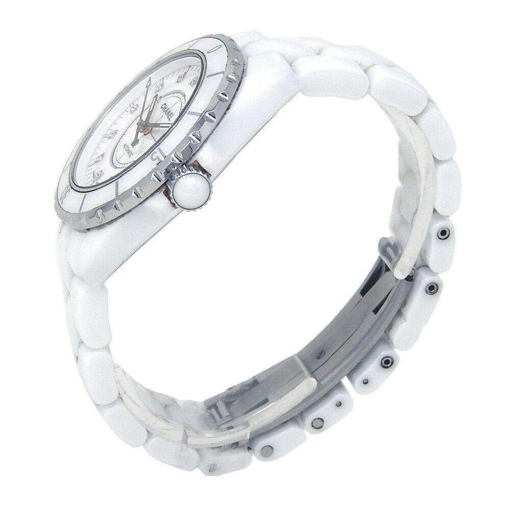 Brand: Chanel
Band Color: White	
Gender:	Women's
Case Size: 36-39.5mm	
MPN: Does Not Apply
Lug Width: 19mm	
Features:	12-Hour Dial, Arabic Numerals, Date Indicator, Diamond Dial, Non-Numeric Hour Marks
Style: Dress/Formal	
Movement: Mechanical