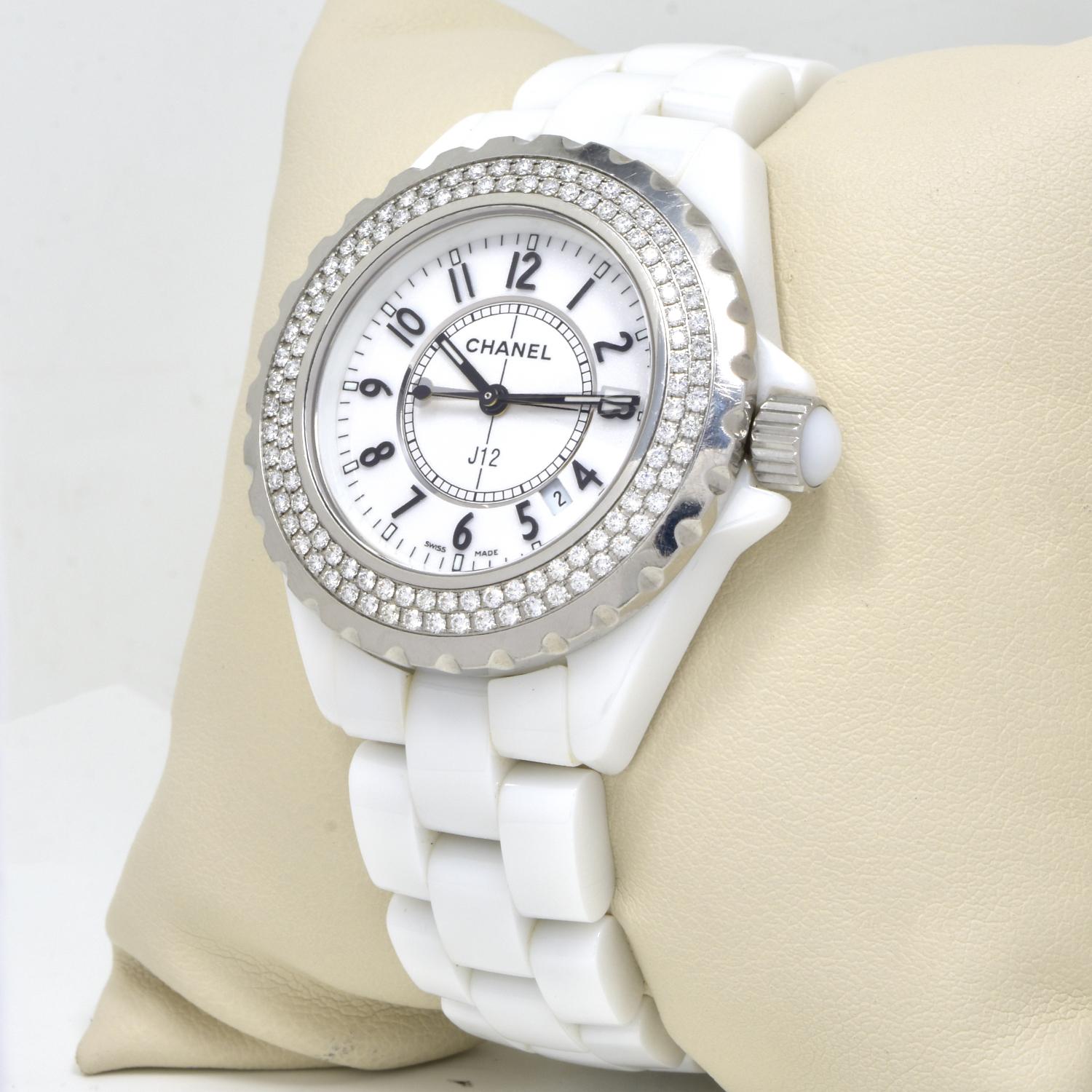 Brand: Chanel

Model: J12

Reference: 55133

Movement: Quartz

Case Size: 31 mm 

Case Material: Stainless Steel and White Ceramic

Bracelet Material: White Ceramic

Crystal: Scratch-Resistant Sapphire Glass

Dial:  White and Diamond Bezel