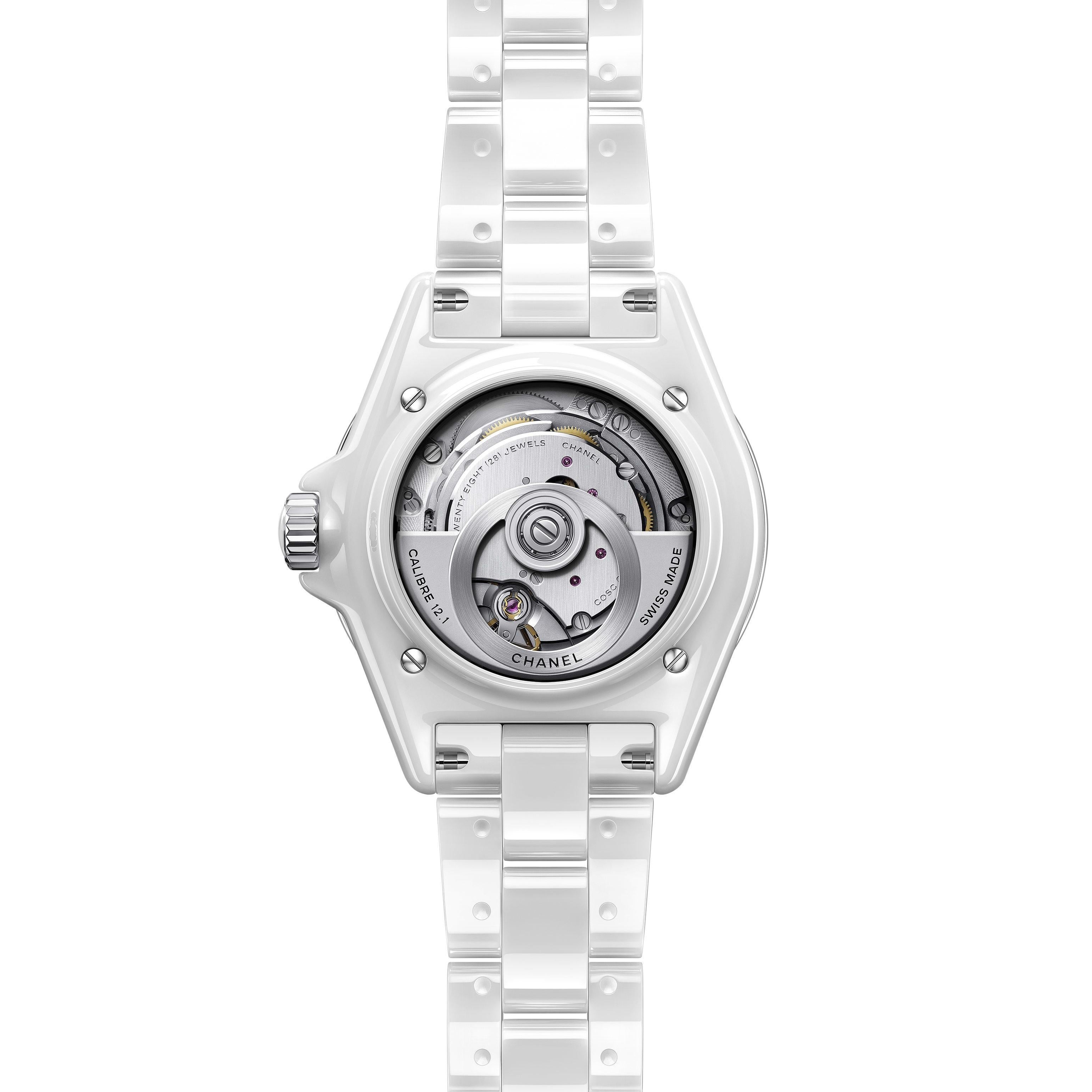 White ceramic case with a white ceramic bracelet. Uni-directional rotating white ceramic bezel. White dial with black hands and Arabic numeral hour markers. Minute markers around the outer rim. Dial Type: Analog. Luminescent hands and markers. Date