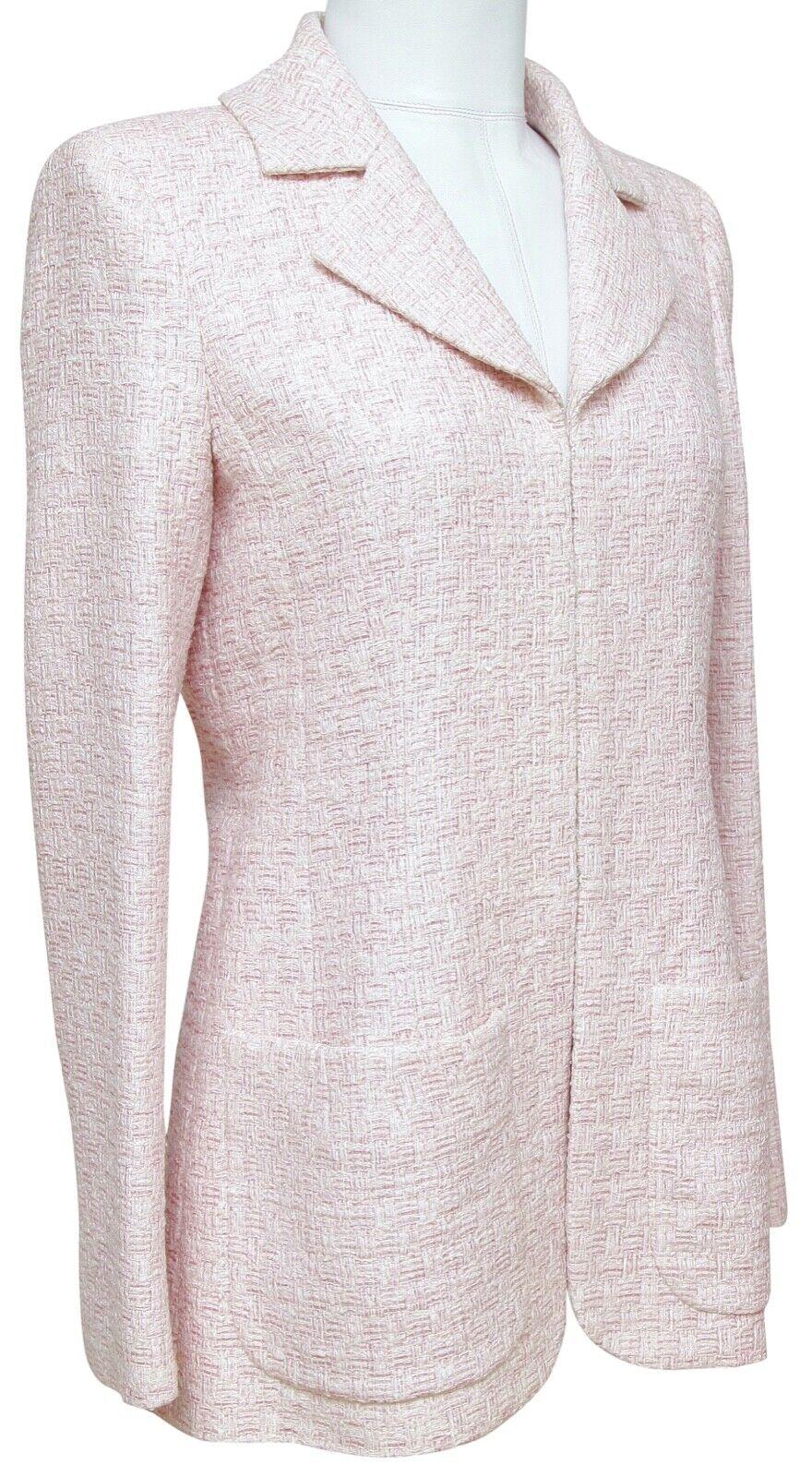 GUARANTEED AUTHENTIC CHANEL CRUISE 2016 SEOUL COLLECTION PINK FANTASY TWEED BLAZER, RUNWAY

Retail $4,200 + tax

Design:
- Iconic Chanel Pink/Ecru tweed fantasy jacket from the 2016 Spring Airline Collection.
- Retail $4,200 + tax.
- Single breast