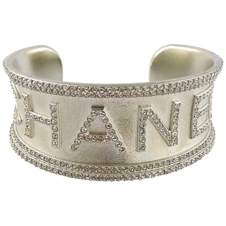 Chanel Jewelled Silver Toned Script Monogram Cuff Bracelet at 1stDibs