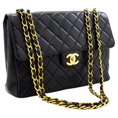 CHANEL Jumbo 11" Borsa a tracolla a catena grande con patta in pelle di agnello nero oro
