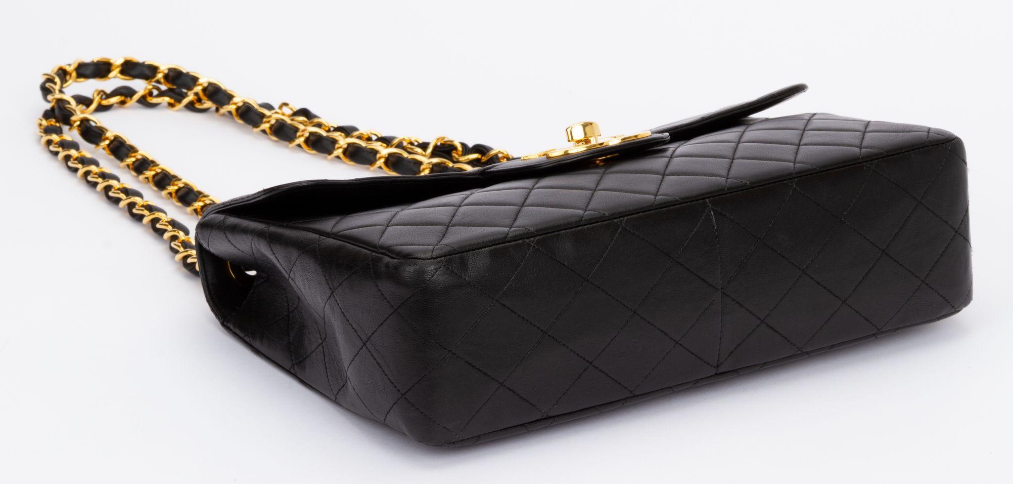 Women's Chanel Jumbo Black 24kt Logo Flap Bag For Sale