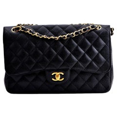 Chanel Black Caviar Maxi Classic Double Flap Bag ○ Labellov ○ Buy and Sell  Authentic Luxury