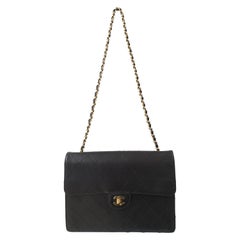 Vintage Chanel Jumbo black caviar leather shoulder bag