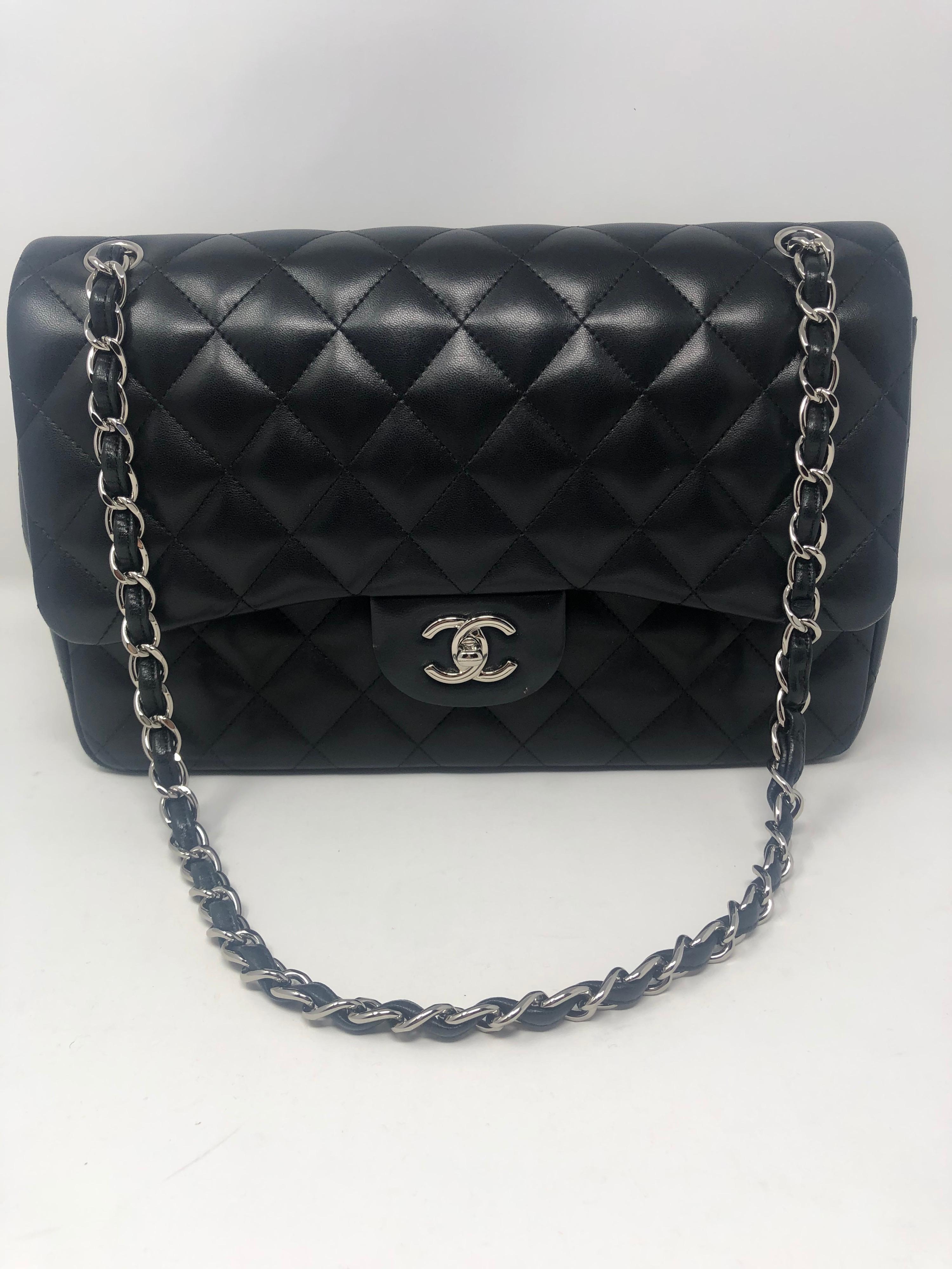 Chanel Jumbo Black Lambskin Leather Double Flap Bag. Silver hardware. Good condition. Chanel keeps going up. Great to invest in the classics just as this. Most wanted jumbo (medium-large size). Hard to find silver hardware too. Don't miss out on