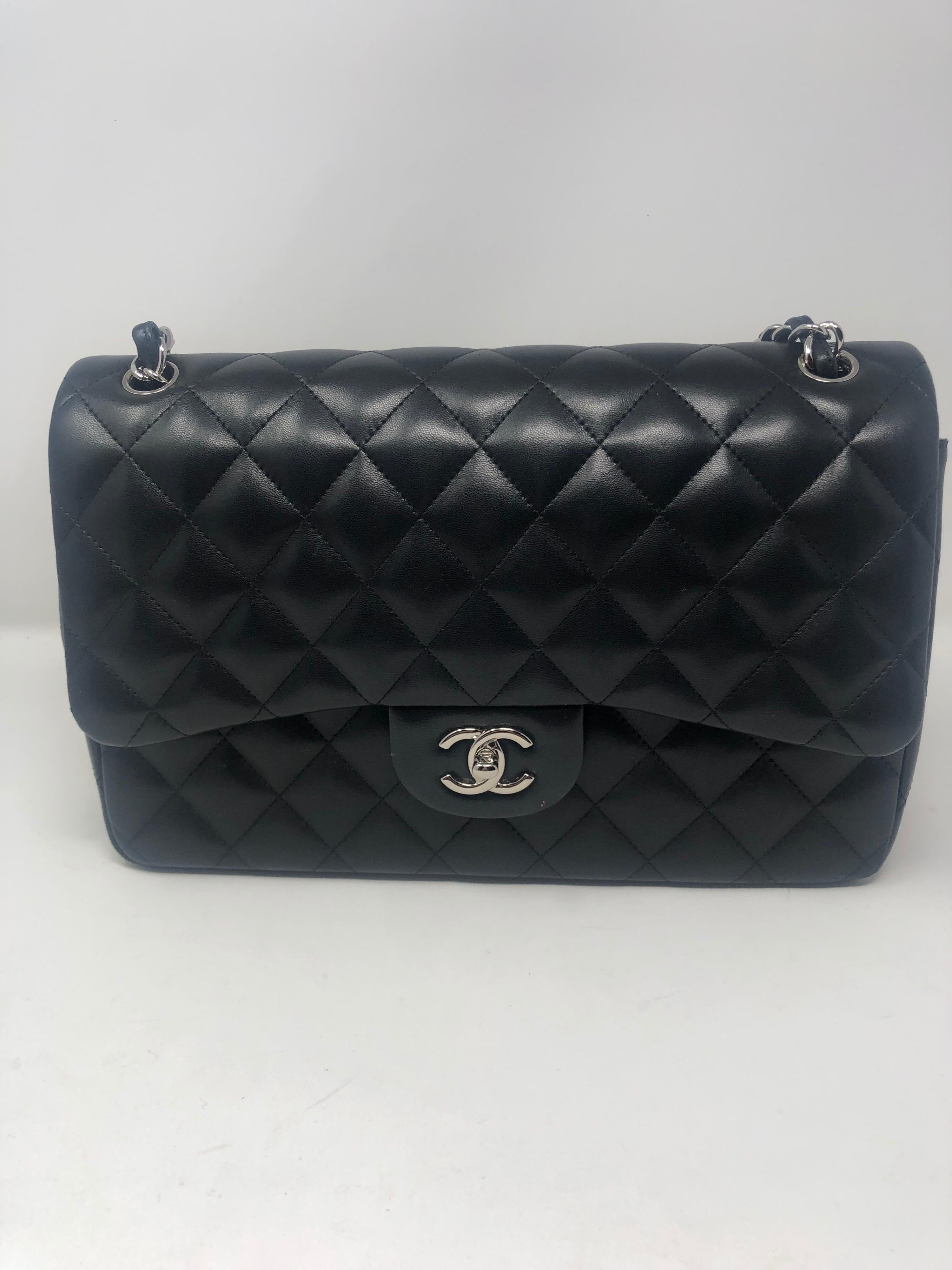 Women's or Men's Chanel Jumbo Black Lambskin Double Flap SHW