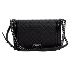 Chanel Jumbo Schwarze gesteppte Boy Bag aus gemischtem Leder