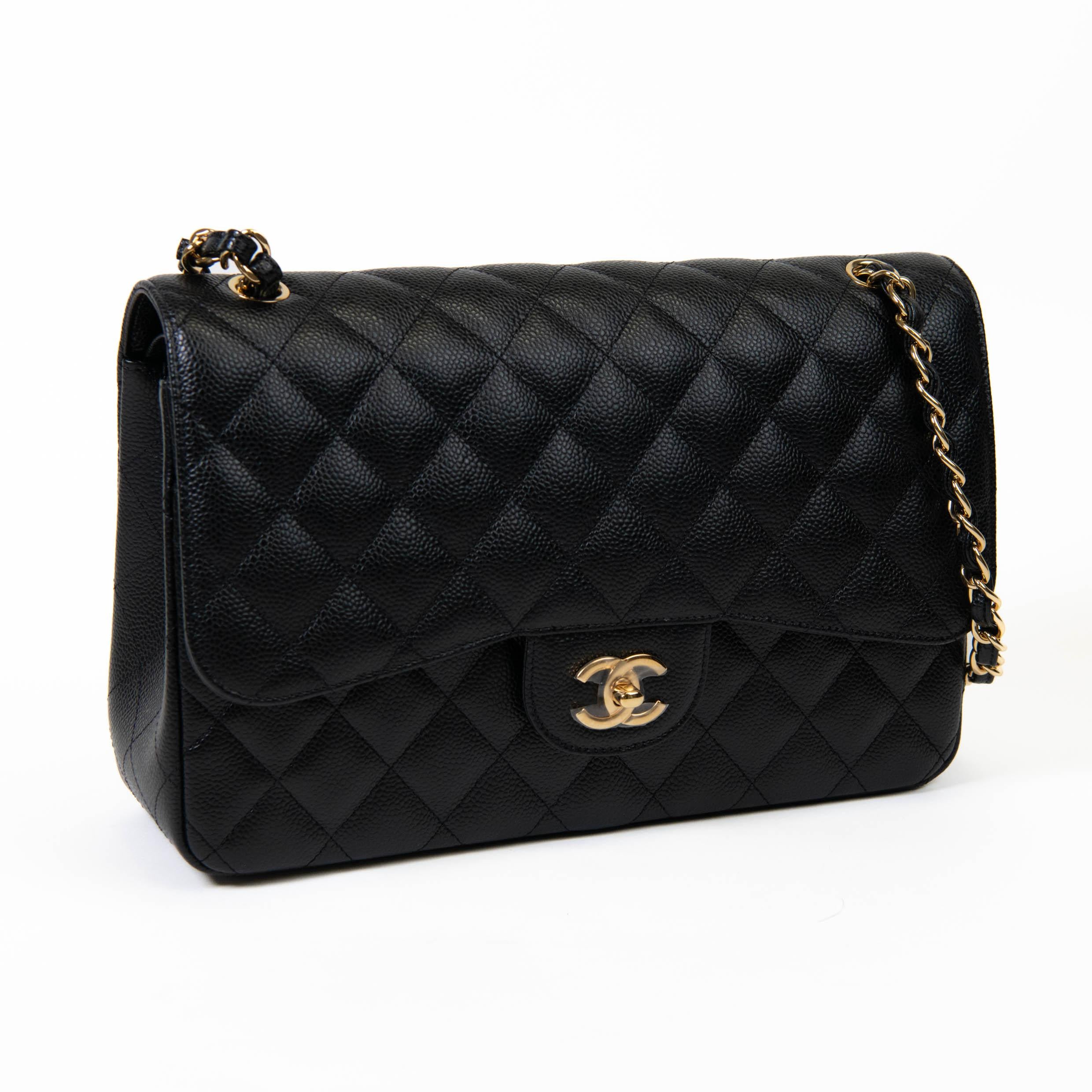 100% Authentic

This Jumbo Classic Double Flap bag is in black caviar leather with gold tone hardware and features a front flap with signature CC turnlock closure, half moon back pocket, and adjustable interwoven gold tone chain link and black