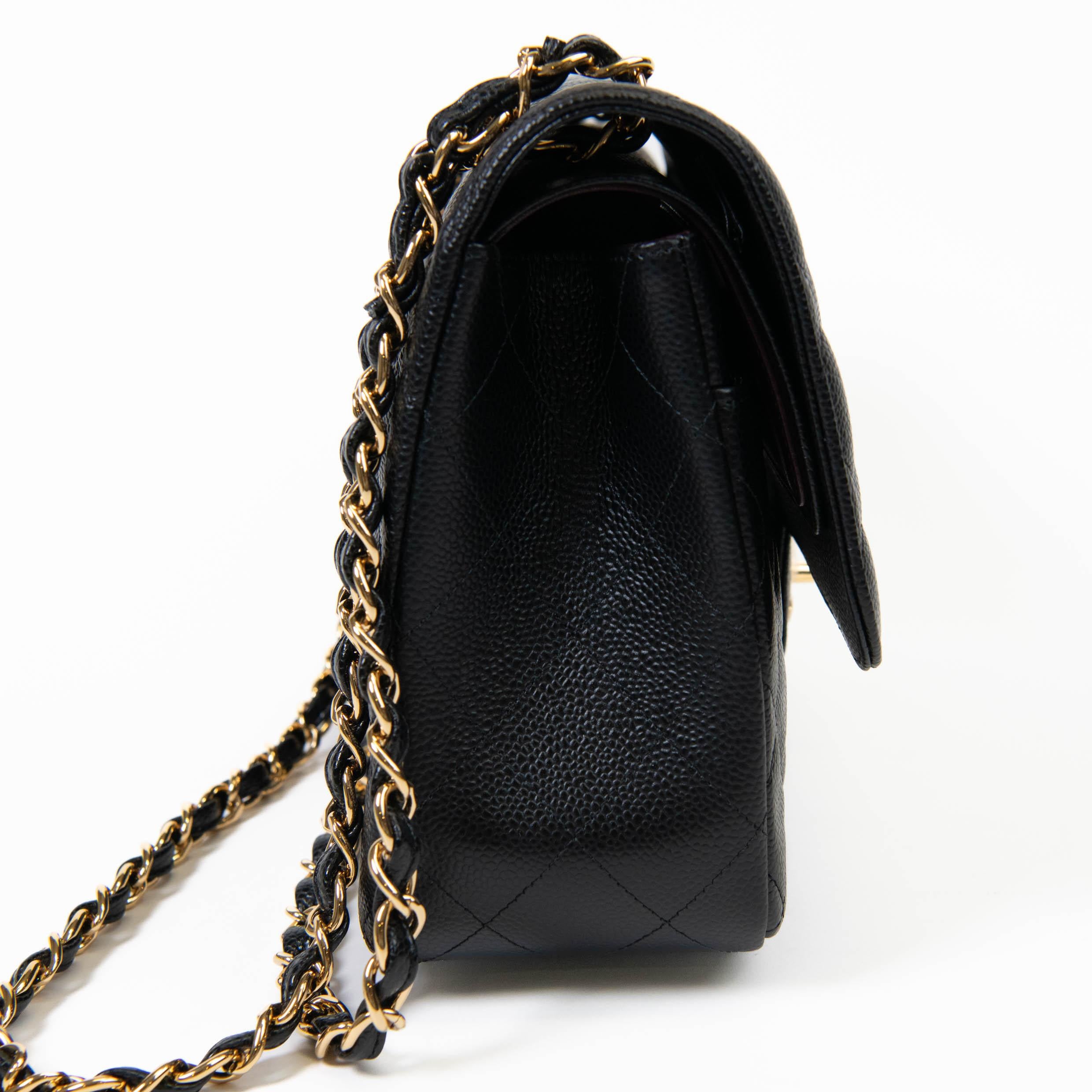 Women's or Men's Chanel Jumbo Classic Double Flap Bag Black Caviar Gold Hardware For Sale