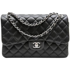 CHANEL 
Jumbo
 Double flap Bag in Black Smooth Lamb Leather