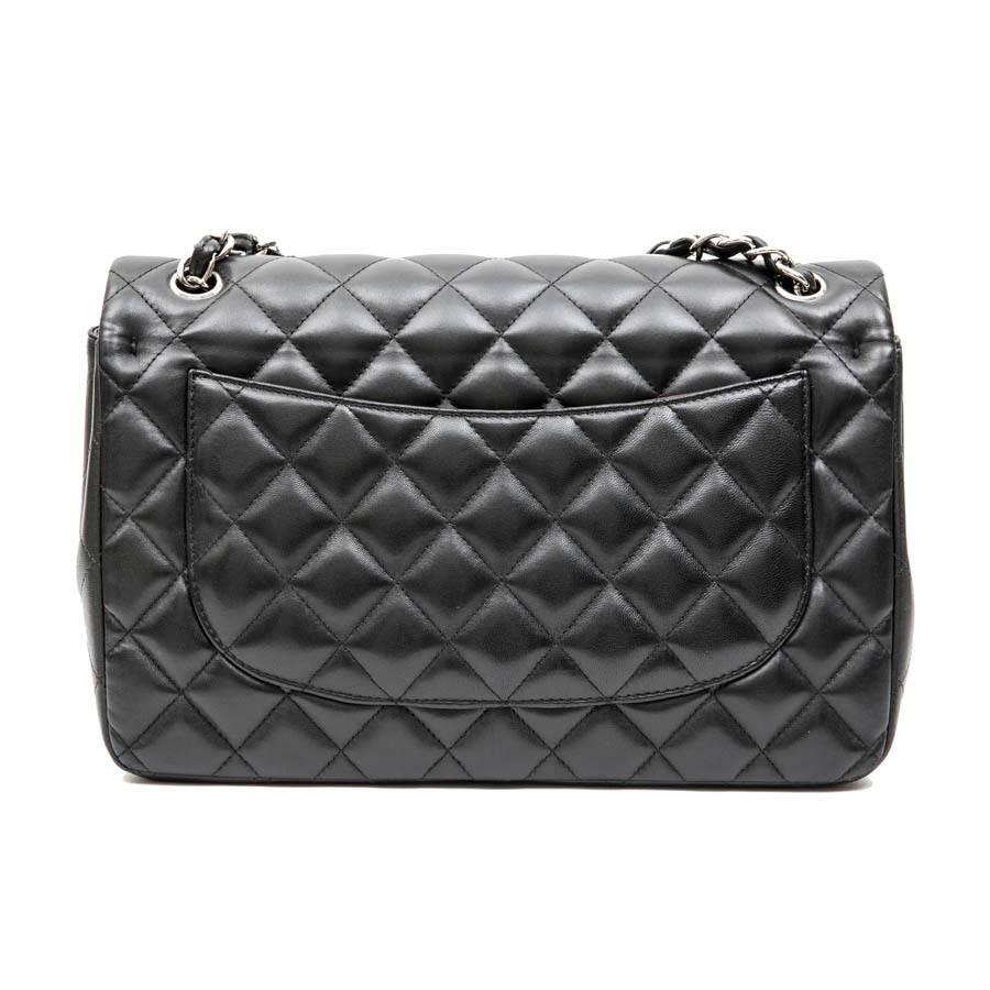 Women's CHANEL Jumbo Double Flap Bag in Black Smooth Quilted Lamb Leather