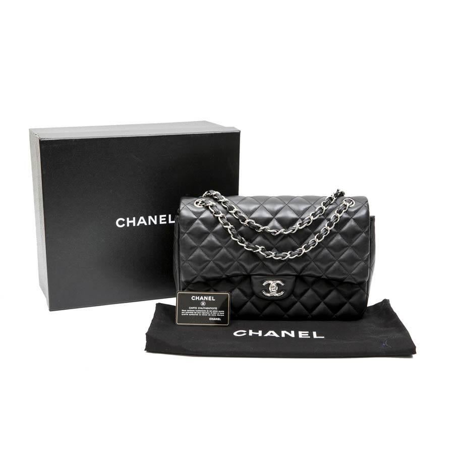 CHANEL Jumbo Double Flap Bag in Black Smooth Quilted Lamb Leather 4