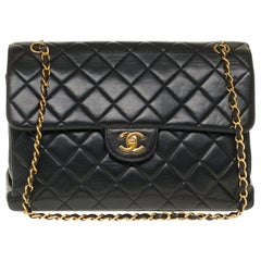 Chanel Jumbo Double Sided Shoulder bag in black quilted lambskin and GHW