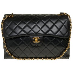 Chanel Jumbo Double Sided Shoulder bag in black quilted lambskin and GHW