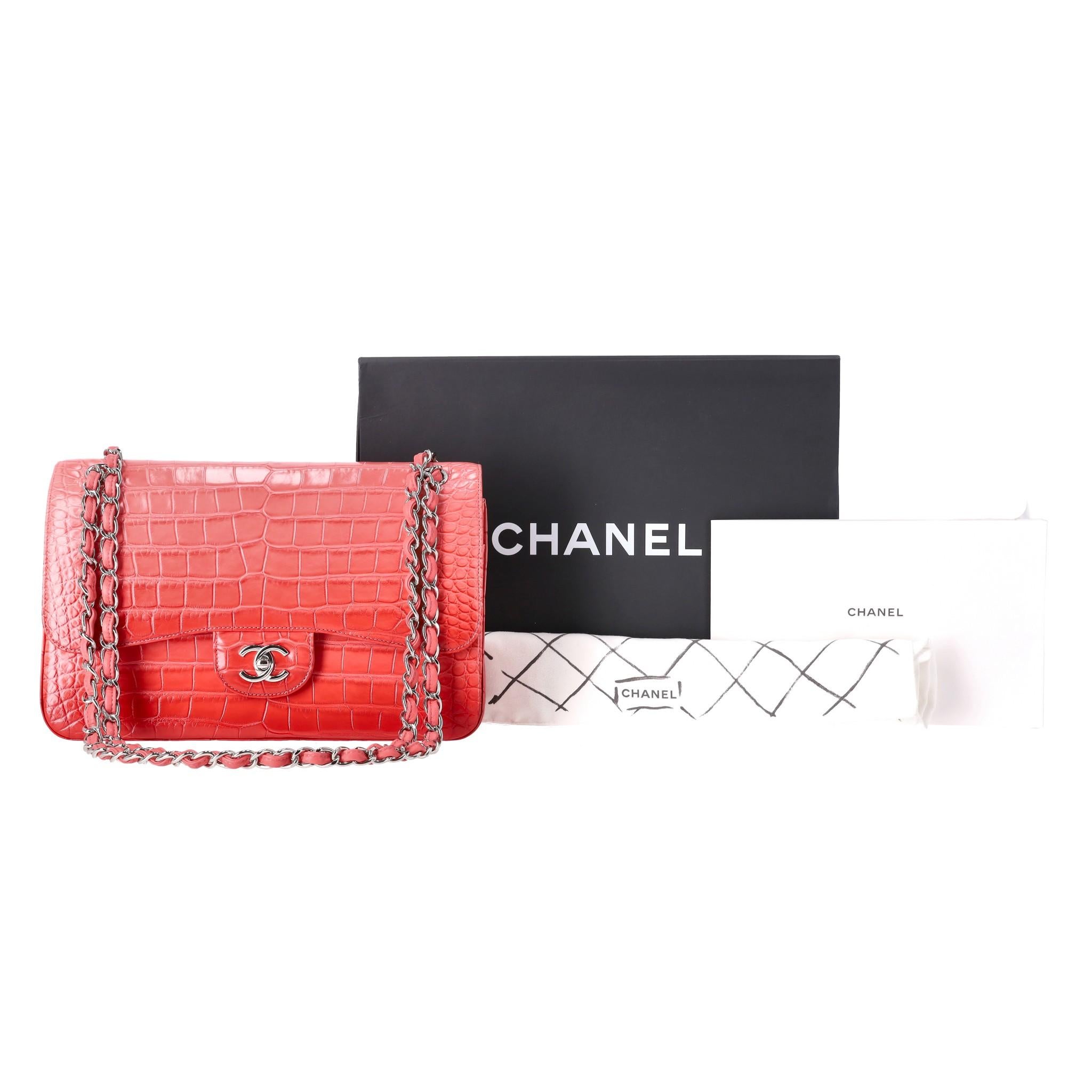 Rare Item - Chanel Jumbo Matte Ombre Alligator Timeless Double Flap

Bag iconic handbag crafted in Alligator skin and silver hardware.

Red double front flap and signature 'CC' turn-lock closure.

Intertwined chain-link strap and open pocket to