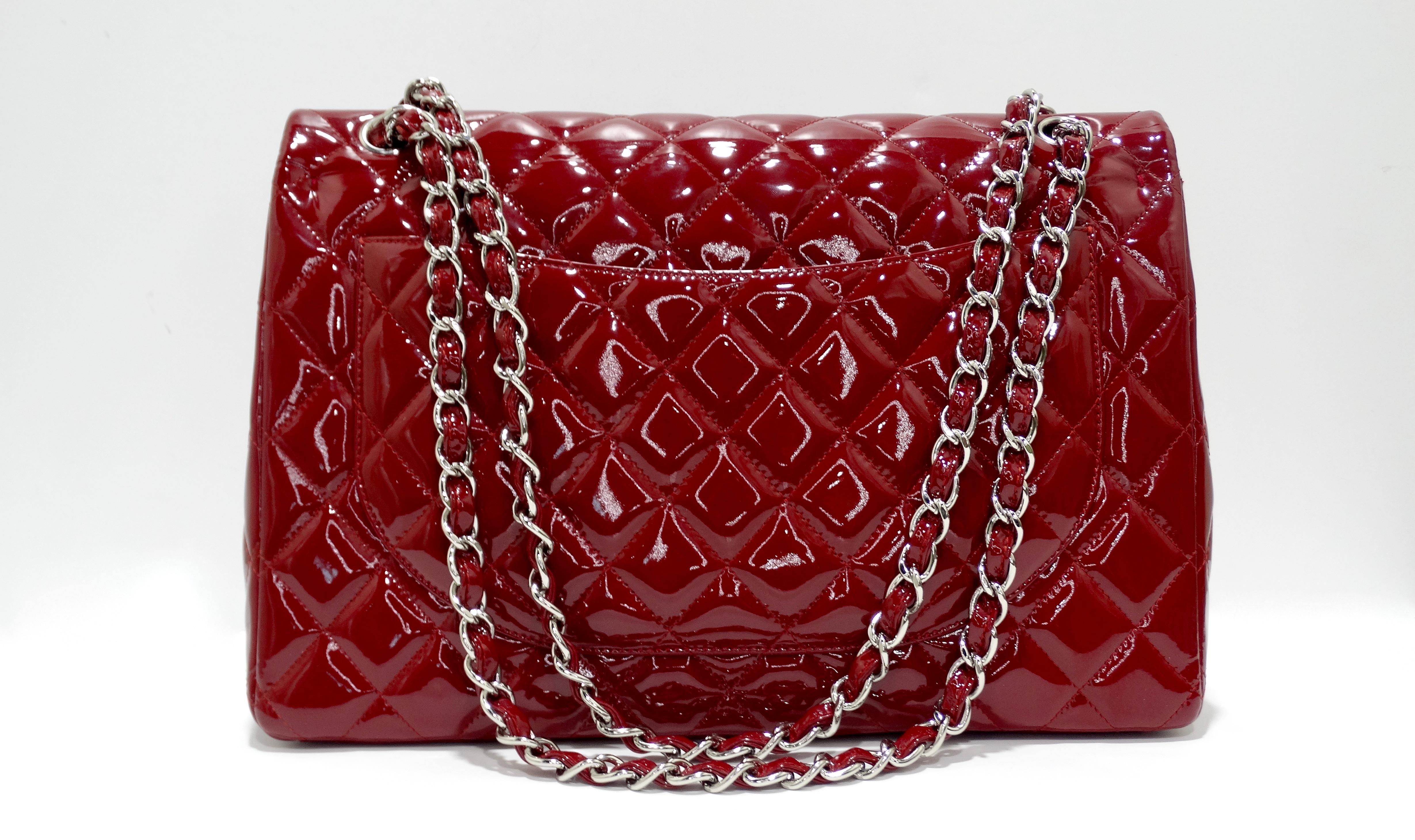 Feel red hot with this stunning red Chanel patent jumbo double flap! Featuring a beautiful red patent leather with silver hardware and a silver chain strap that can be worn cross body or doubled up to be a shoulder bag. Features leather