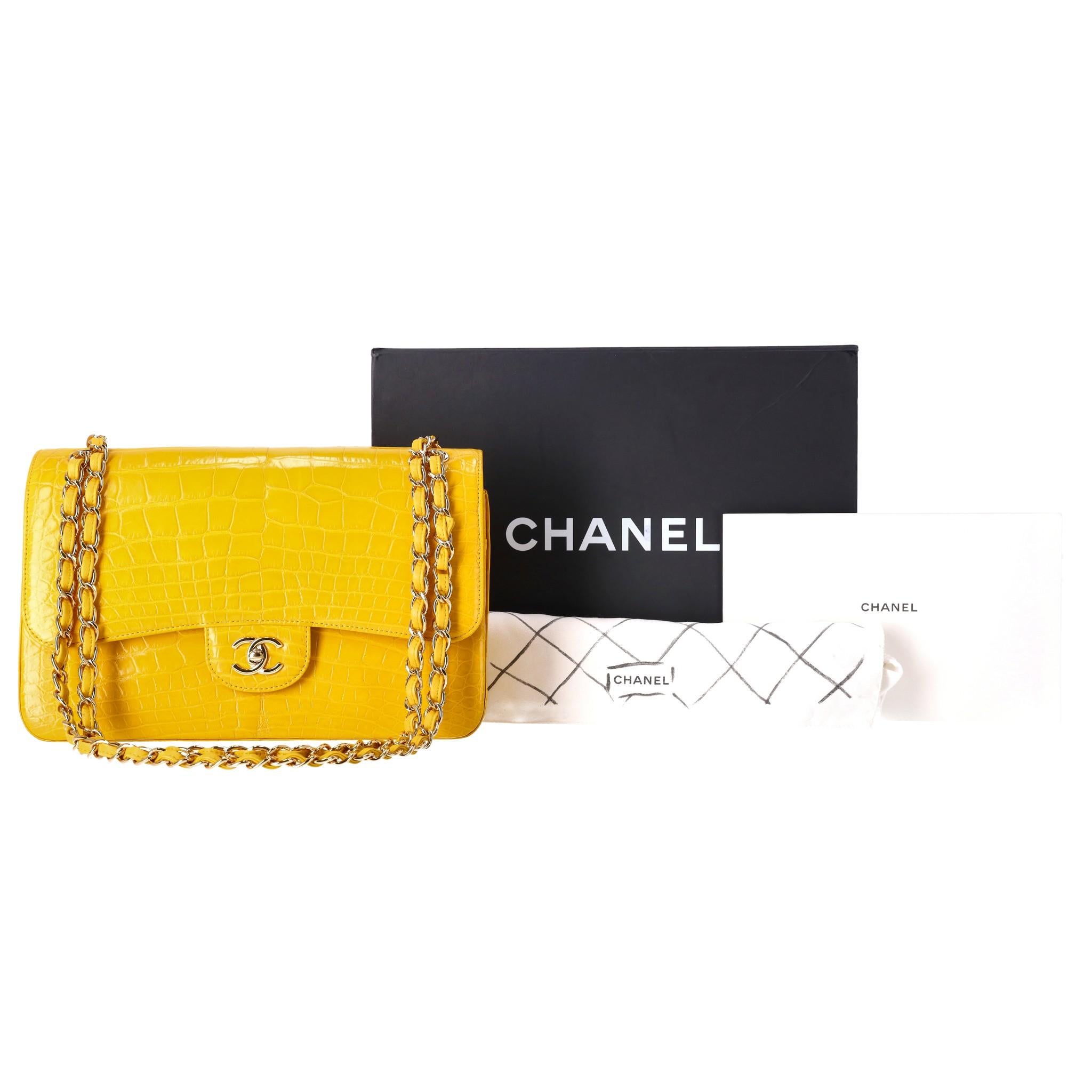 Rare Item - Chanel Jumbo Shiny Skin Alligator Timeless Double Flap Bag

Bright yellow iconic handbag crafted in Alligator skin and gold hardware.

Double front flap and signature 'CC' turn-lock closure.

Intertwined chain-link strap and open pocket