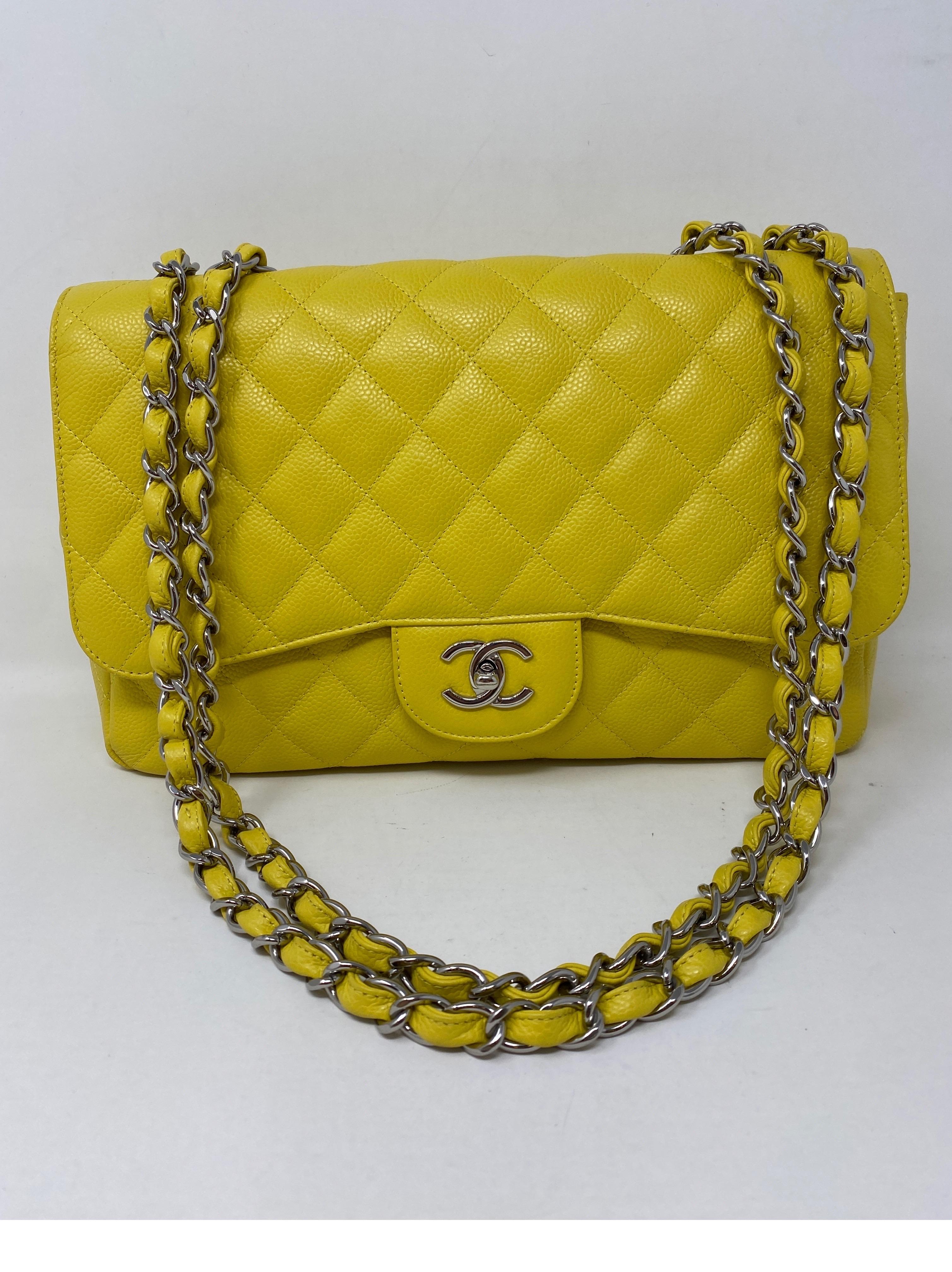 Chanel Yellow Jumbo Bag. Caviar bright canary yellow color. Silver hardware. Excellent condition. Rare color. Guaranteed authentic. 