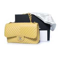 Chanel, Jumbo yellow chevron lamb leather flap bag