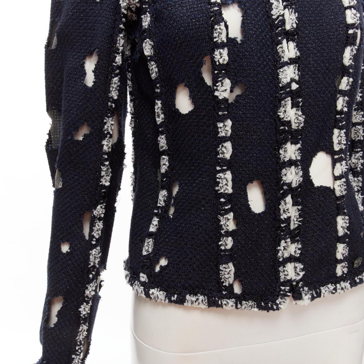 CHANEL Karl Lagerfeld 11P Runway Marienbad punk distressed tweed jacket FR38 M
Reference: TGAS/C01883
Brand: Chanel
Designer: Karl Lagerfeld
Collection: 11P - Runway
Material: Tweed, Polyester
Color: Blue, White
Pattern: Solid
Closure: Zip
Lining: