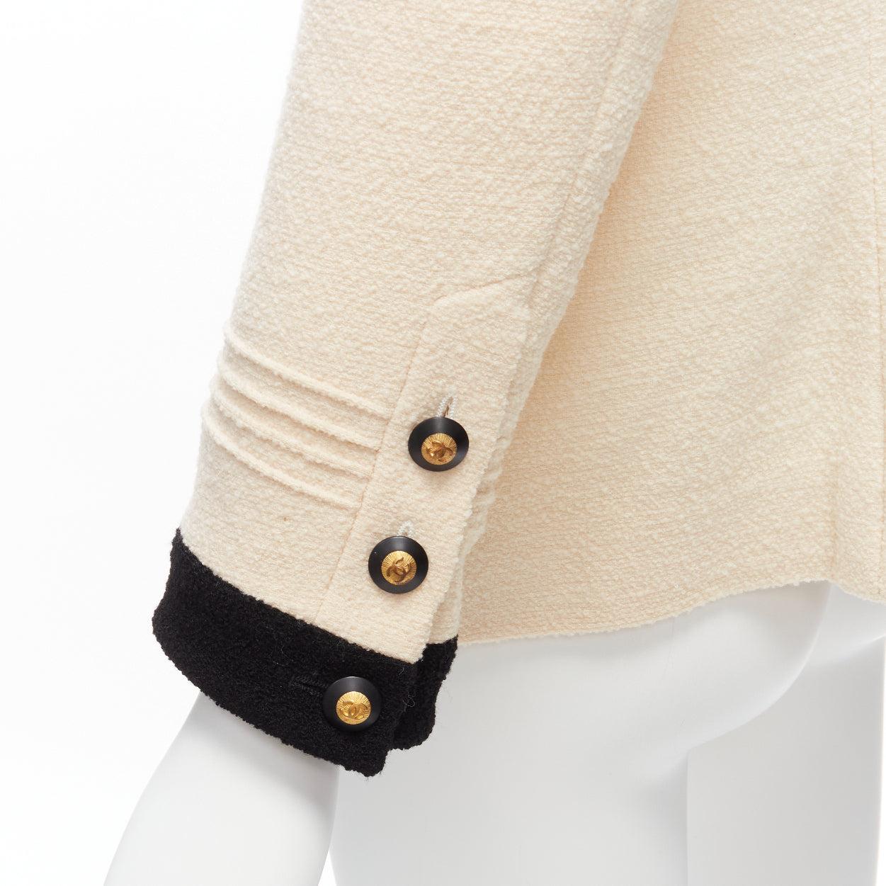 CHANEL Karl Lagerfeld 93A Vintage cream black trim boucle tweed jacket FR44 XXL
Reference: TGAS/D00545
Brand: Chanel
Designer: Karl Lagerfeld
Collection: 93A
Material: Wool, Blend
Color: Black, Cream
Pattern: Solid
Closure: Button
Lining: Beige
