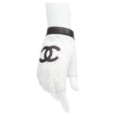 CHANEL Karl Lagerfeld black CC logo eyelet white leather fingerless gloves US7