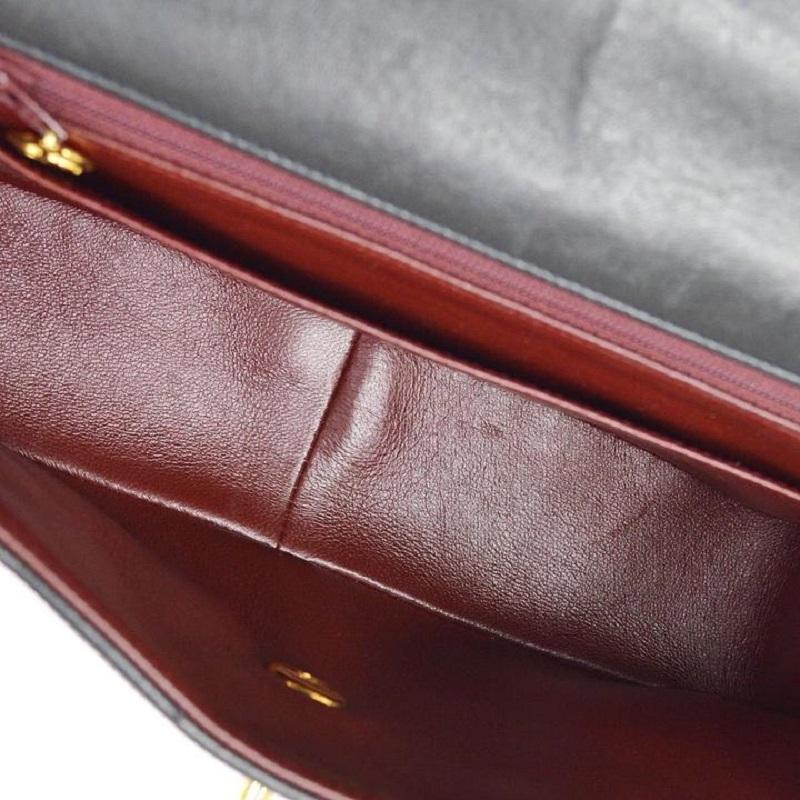 CHANEL Kelly, pelle d'agnello nera trapuntata, borsa a tracolla Chevron con manico superiore 2