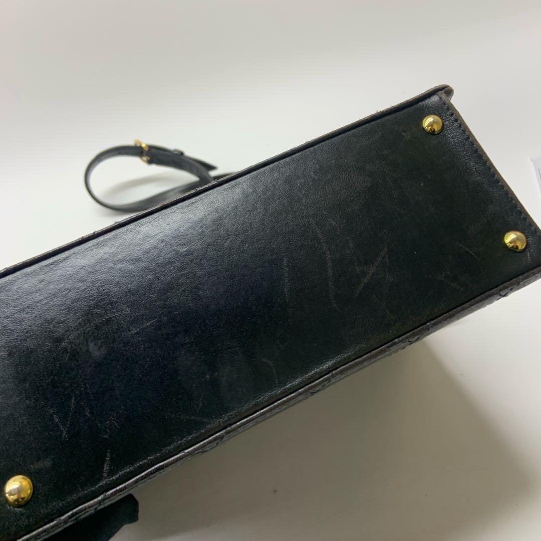 Chanel Bolso con solapa Kelly Piel negra Correa ajustable Herrajes dorados 24k en venta 7