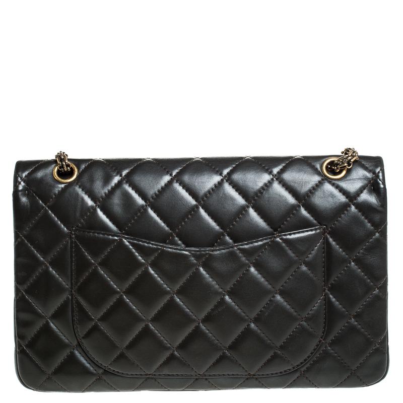 Chanel's Flap Bags are iconic and monumental in the history of fashion. This Reissue 2.55 is a buy that is worth every bit of your splurge. Exquisitely crafted from khaki brown leather, it bears their signature quilt pattern and the iconic