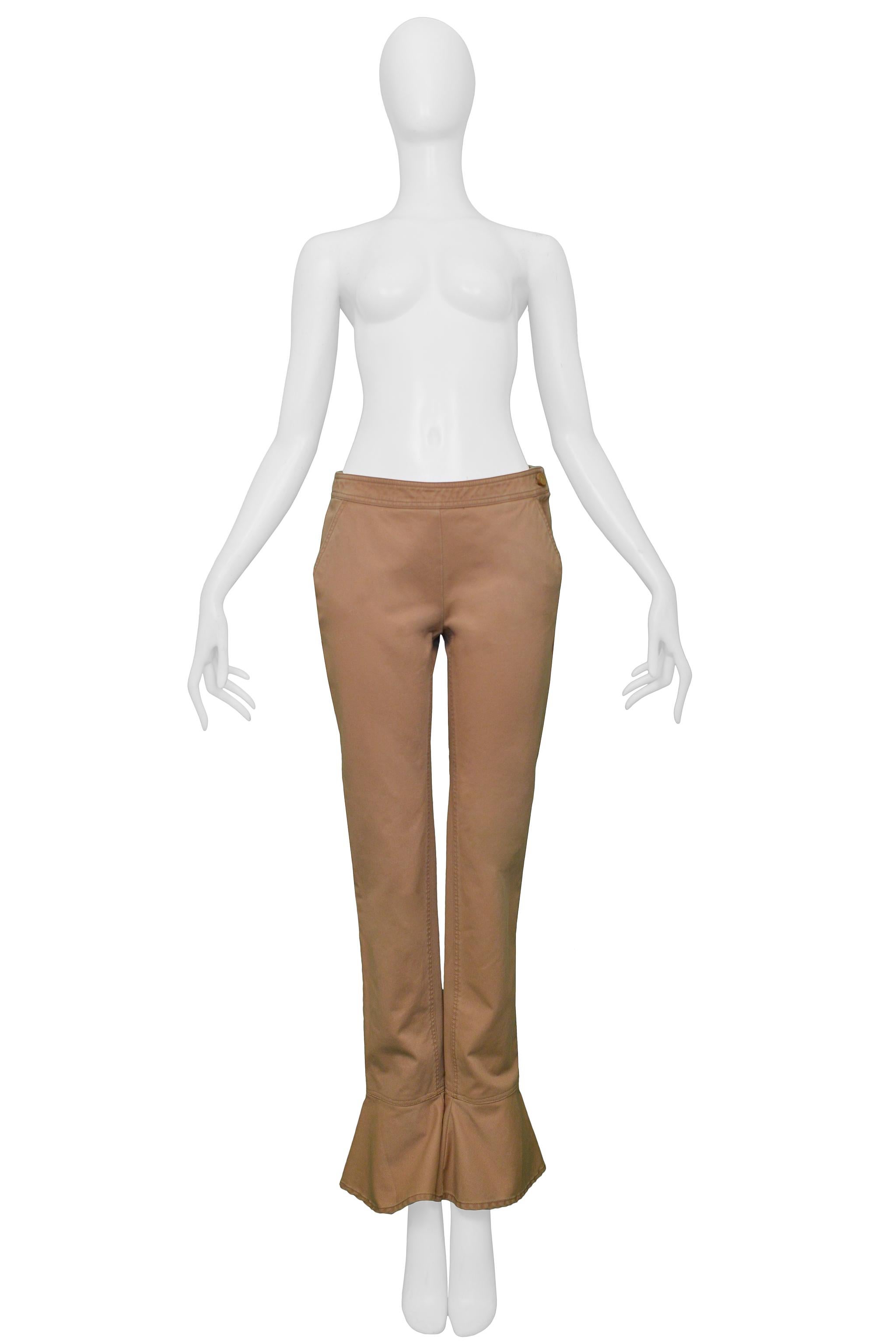Resurrection Vintage is excited to offer a pair of vintage Chanel khaki cotton flared pants featuring, front side pockets, back patch pockets, a side zipper, straight legs, flared ankles, and a 