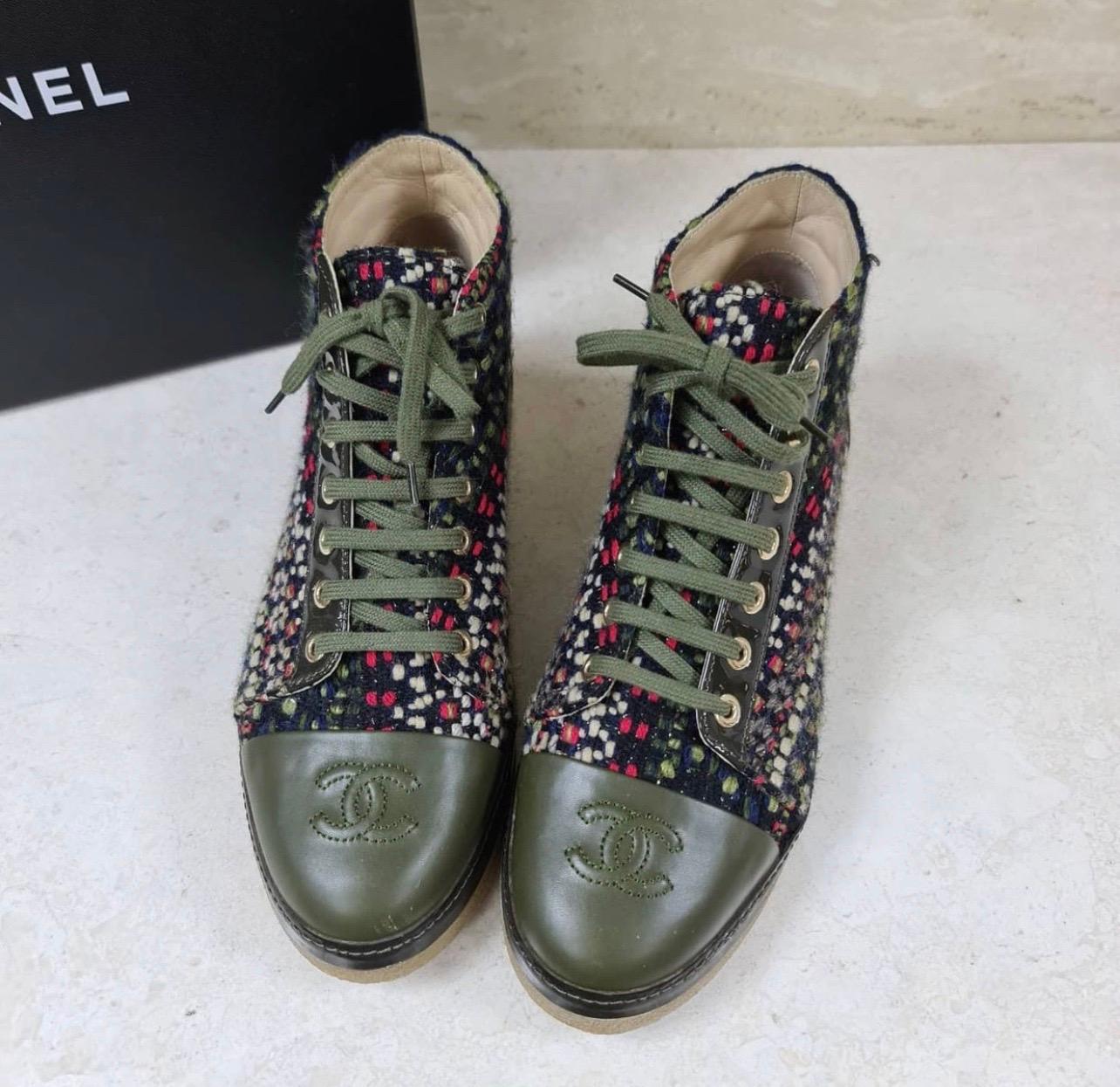 Category: Shoes. 
Sub-category: Ankle Boots. 
Designer: Chanel. 
Condition: Good used. Slight scratches on toes.
Material: Tweed, Leather
Colour: khaki. 
Size: 38.5 EU
No original packaging.