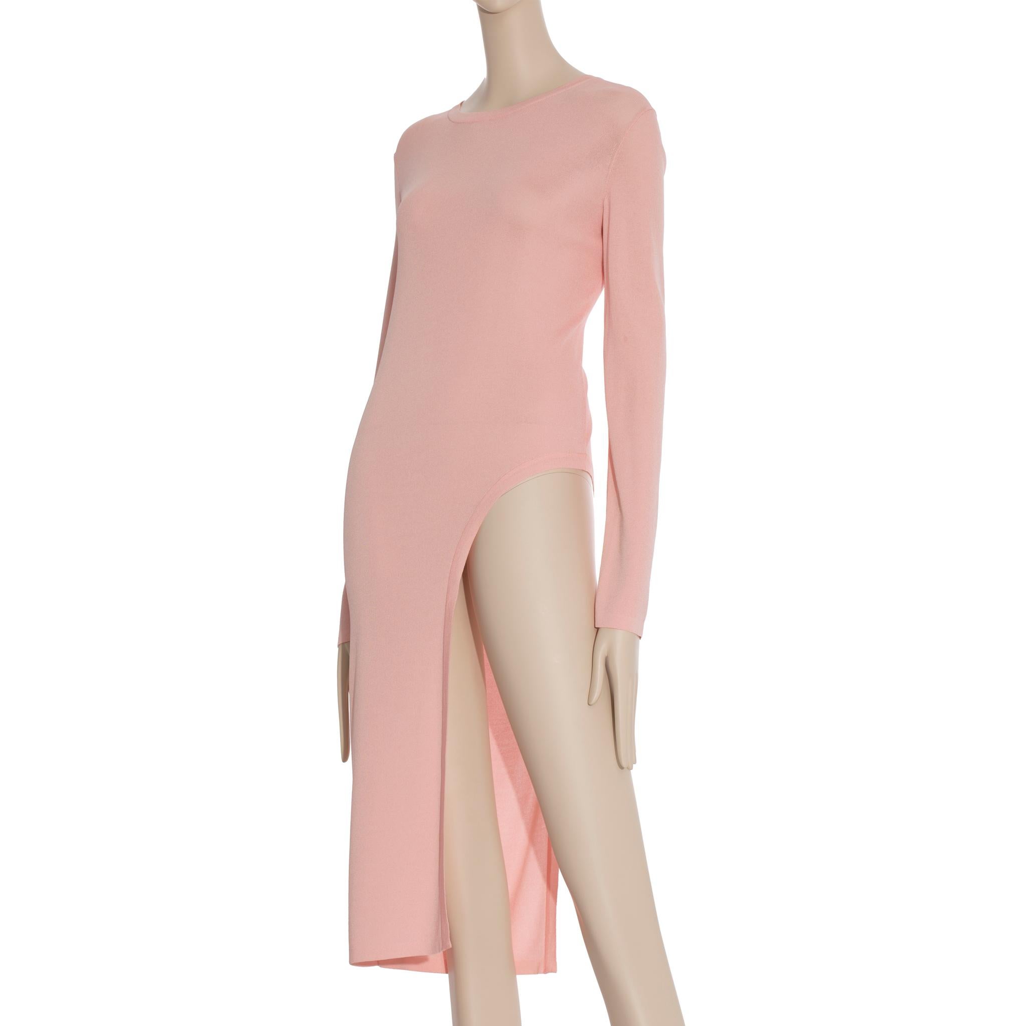 This stylish Chanel Knit Pink Long Sleeve Dress/Top is perfect for the summer season. Its light and breathable fabric is ideal for beach days, while its classic design and comfortable fit make it suitable for almost any