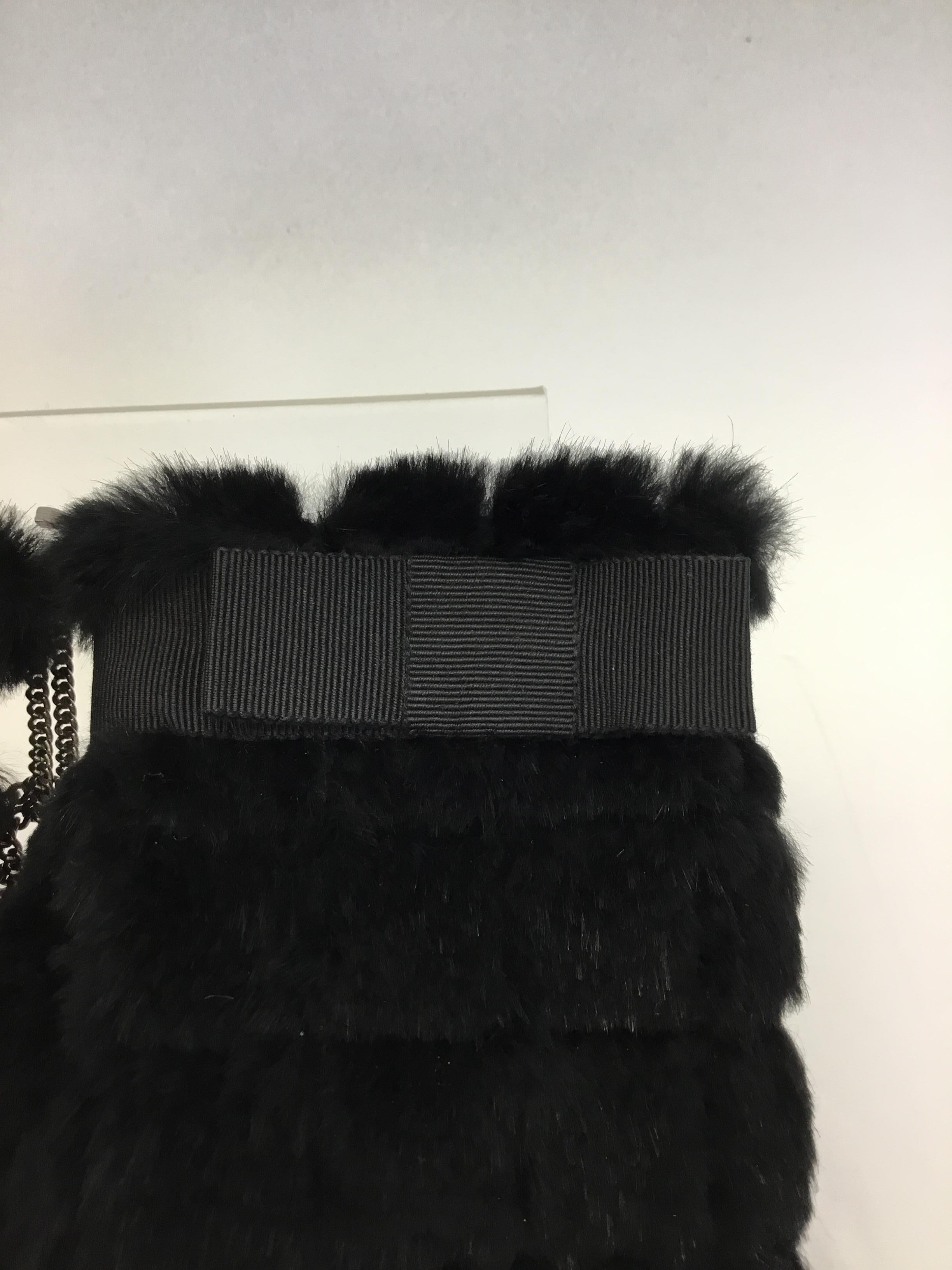 Chanel Knit Rabbit Fur Mittens with Chain
$399
Comes with box
Made in Belgium 
100% Rabbit fur
Size medium