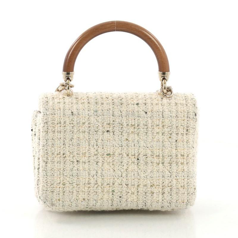 chanel knock on wood top handle bag quilted lambskin mini