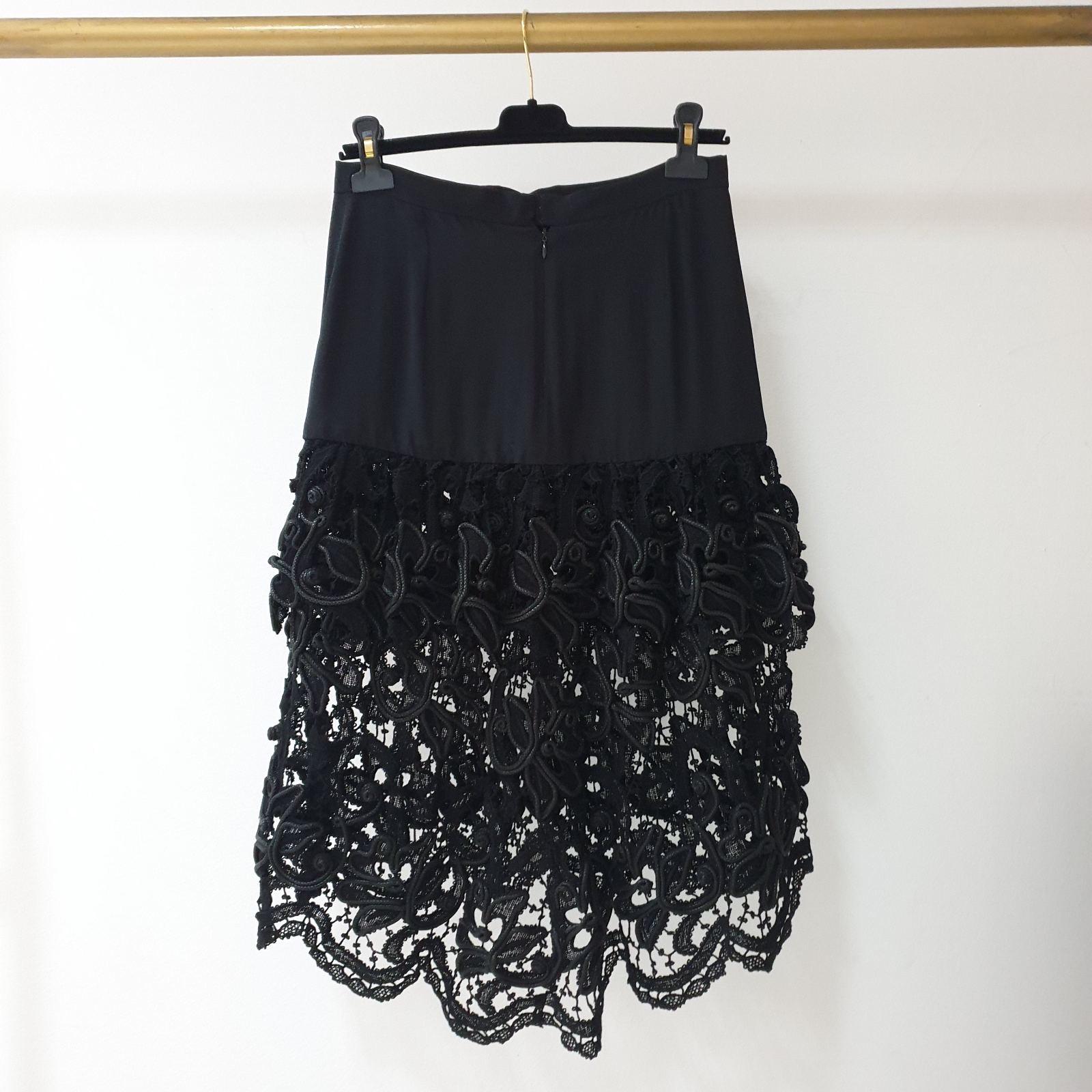 
Chanel Lace Bottom Black Skirt
Rare collectors item.
Sz.36/
Condition is very good.
