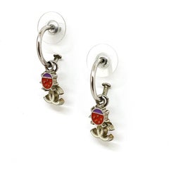 CHANEL Ladybug Pink And Purple Earrings