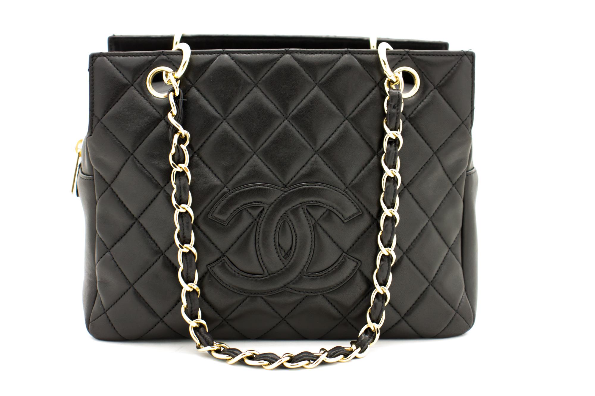 An authentic CHANEL made of black Lambskin Chain Shoulder Bag Shopping Tote Black Quilted. The color is Black. The outside material is Leather. The pattern is Solid. This item is Contemporary. The year of manufacture would be 2 0 0 2 .
Conditions &