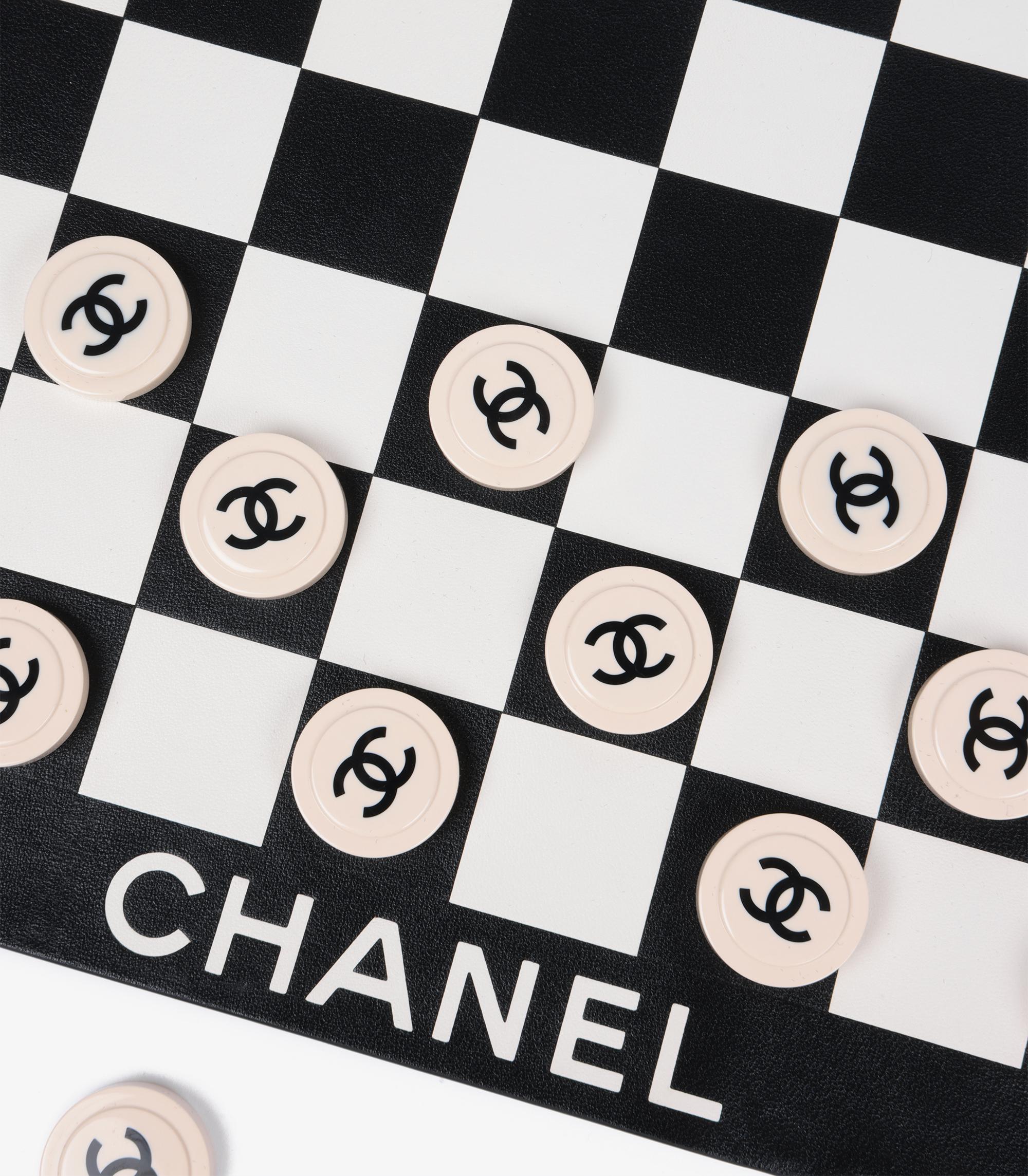 Chanel Black & White Lambskin Leather & Resin Silver Plated Limited Edition Checkerboard

Brand- Chanel
Model- Checkerboard
Product Type- Checkerboard
Age- Circa 2021
Accompanied By- Chanel Dust Bag, Box, 19 White Checkers, 21 Black Checkers
Colour-