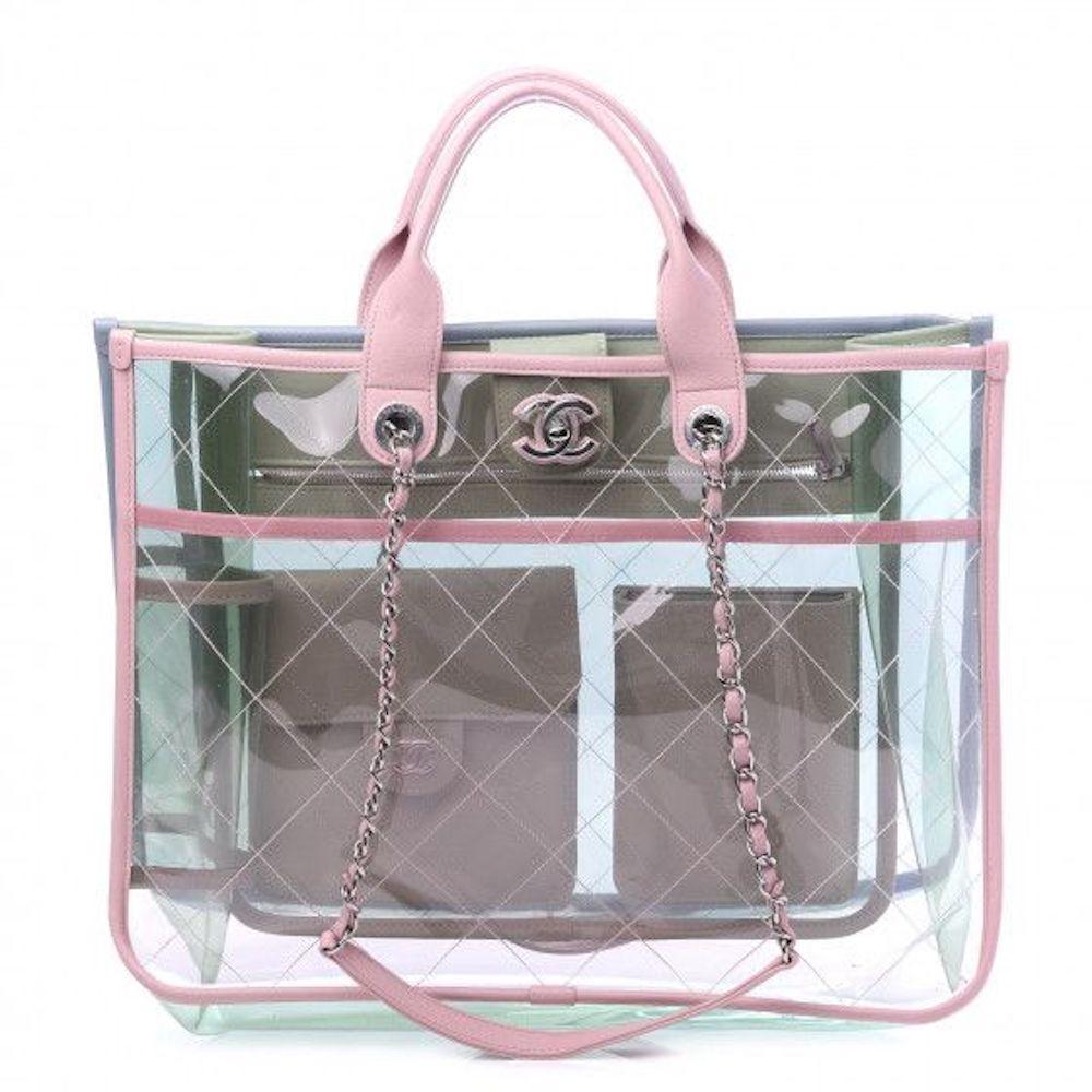 This Chanel Lambskin & PVC Quilted Bag is a unique and stylish piece that is sure to turn heads wherever you go. It is made from high-quality lambskin and PVC and features a beautiful pastel pink and clear color combination. The bag is in pristine