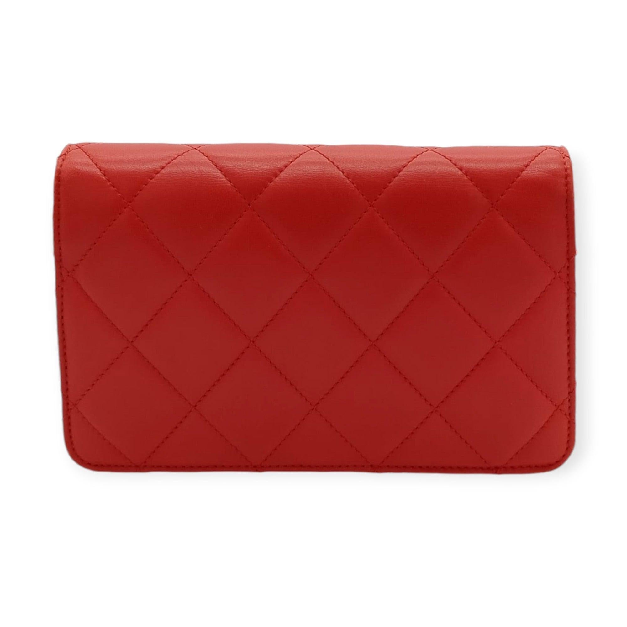 Introducing the Chanel Lambskin Quilted Golden Class Wallet on Chain in Red—an elegant blend of style and functionality. Crafted from diamond-quilted lambskin in a vibrant red, it features a removable leather-threaded gold chain strap and a timeless