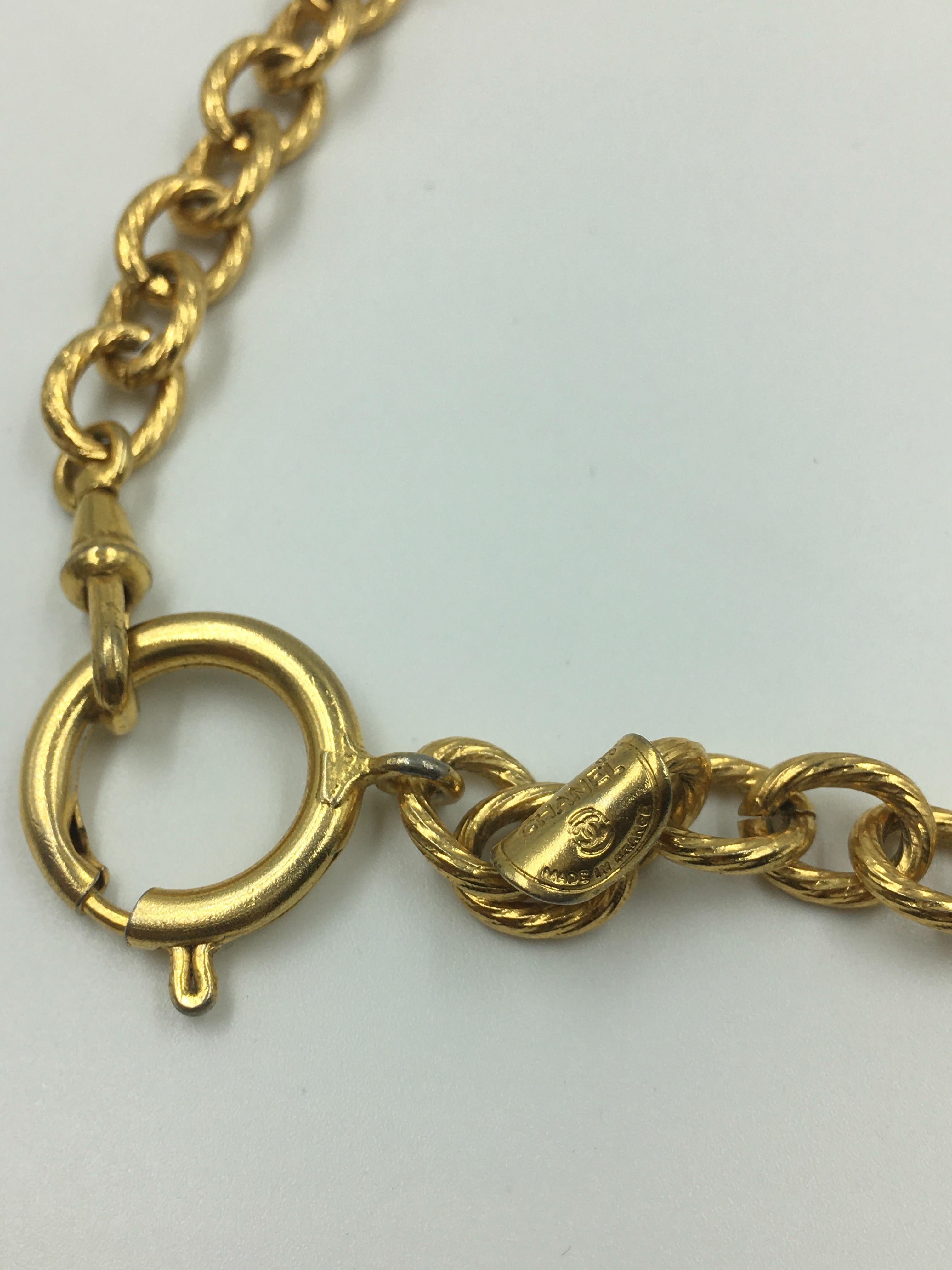 Chanel large 6 Charm Necklace rare iconic gold tone metal In Good Condition For Sale In Los Angeles, CA