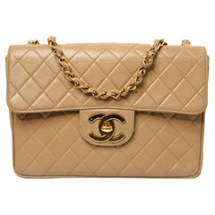 Chanel - Grand sac à main en cuir d'agneau matelassé beige à rabat unique circa 1994-96