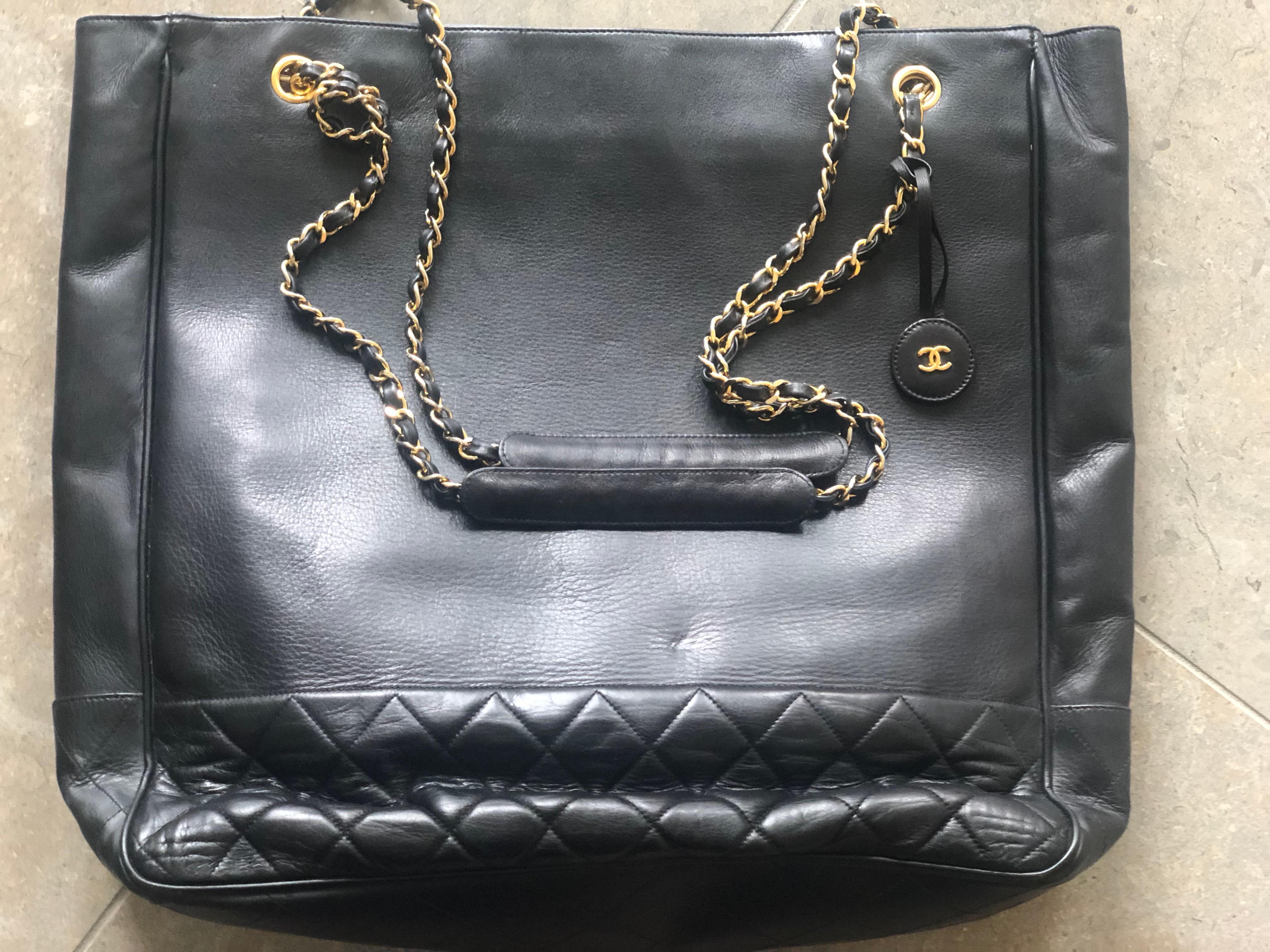 Chanel Large Black Leather Shoulder Bag with Gold Hardware and Quilted Details .
16