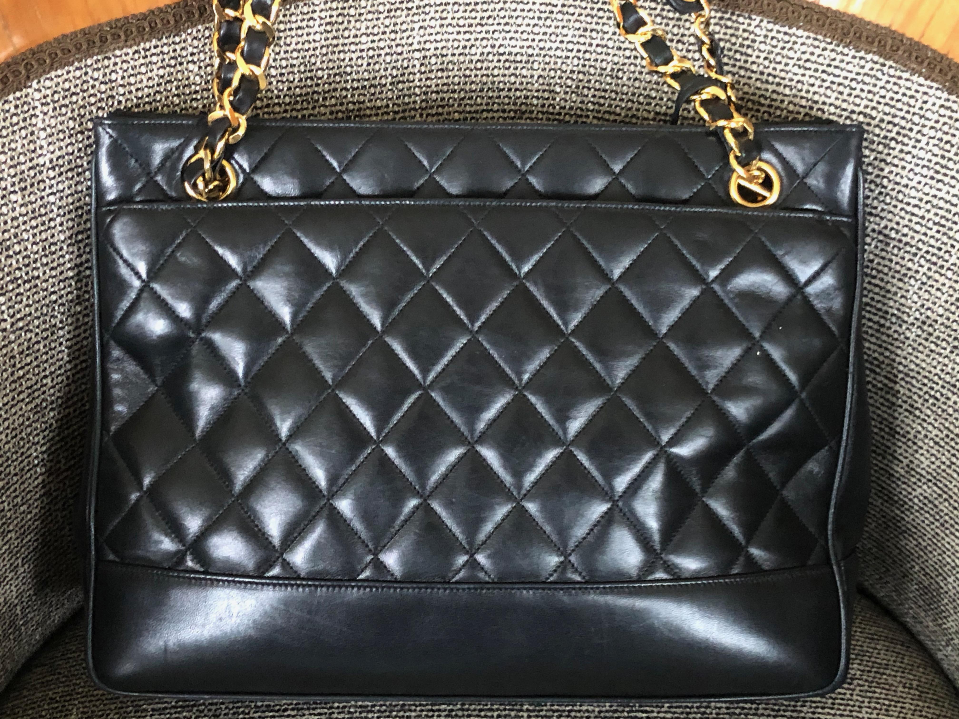 Women's or Men's Chanel Large Black Leather Shoulder Bag with Gold Hardware and Quilted Details  For Sale