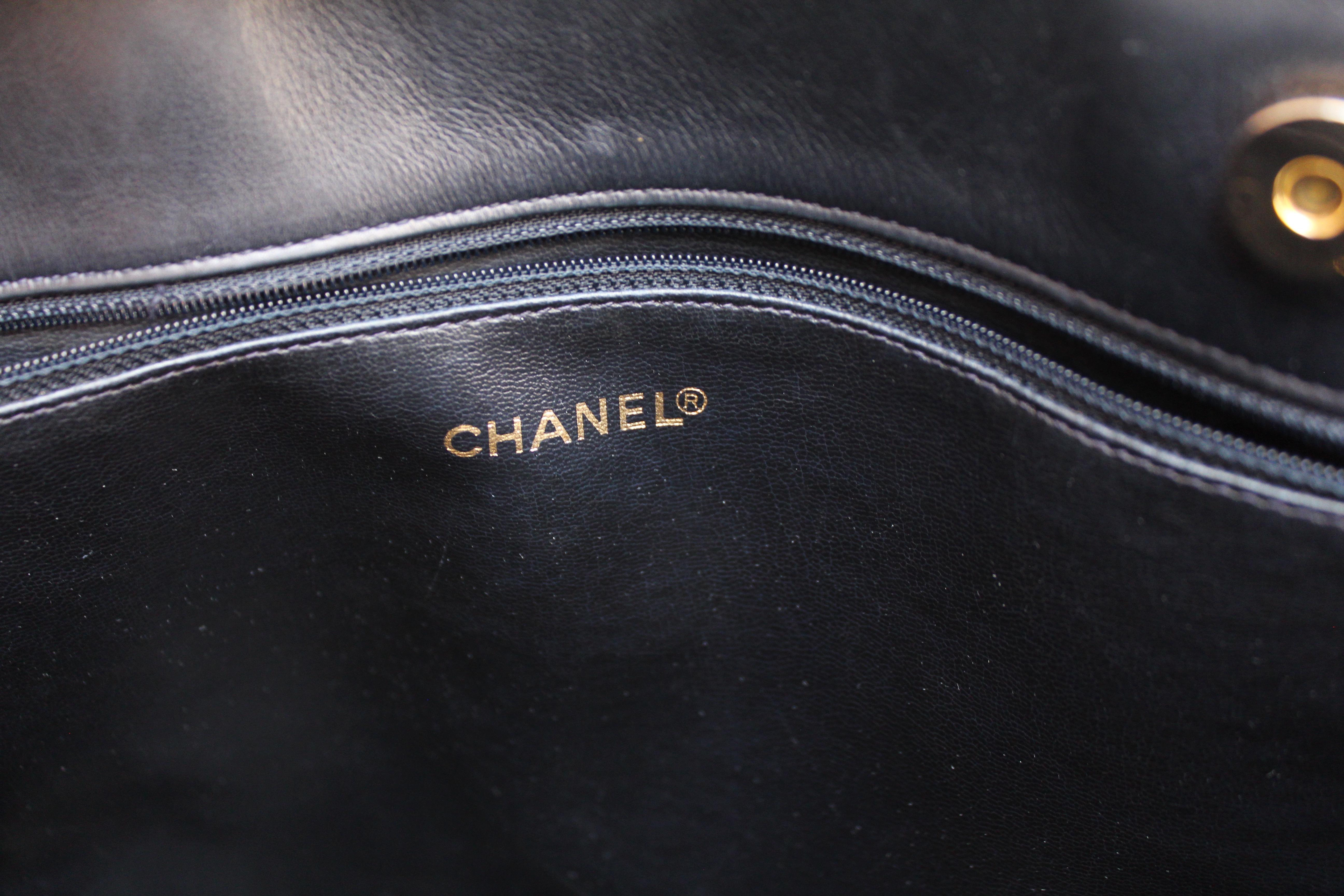 Chanel large black quilted leather bag, 1990’s 7