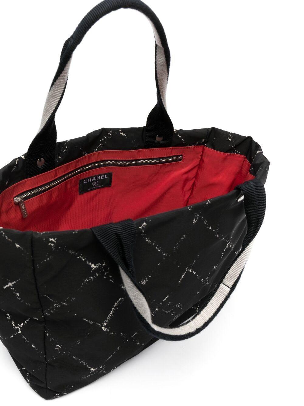 black tote with red lining
