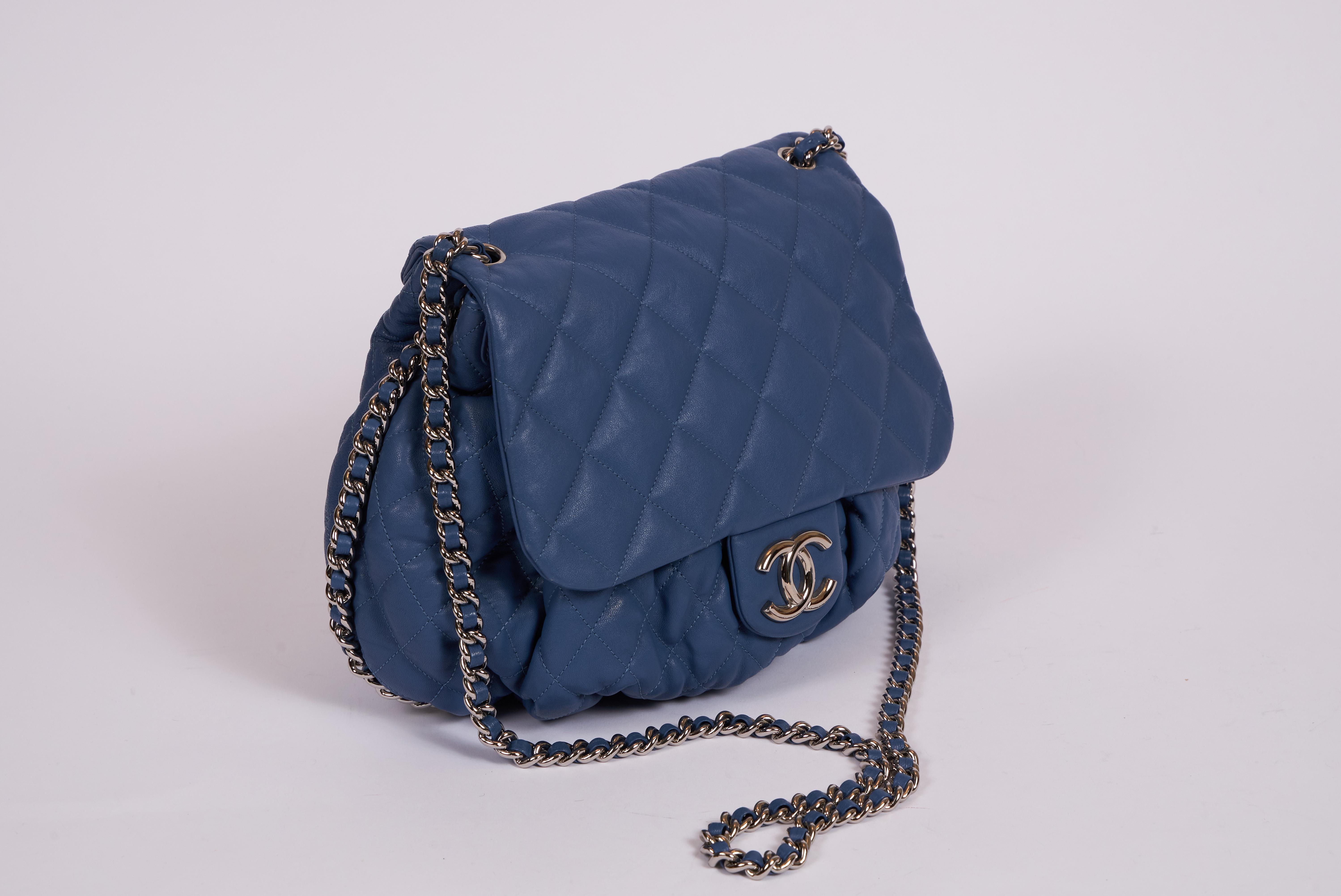 Chanel large chain around powder blue bag with silver tone hardware. Can be worn cross body or strap can be doubled for shoulder length. Comes with hologram , ID card and original dust cover.
