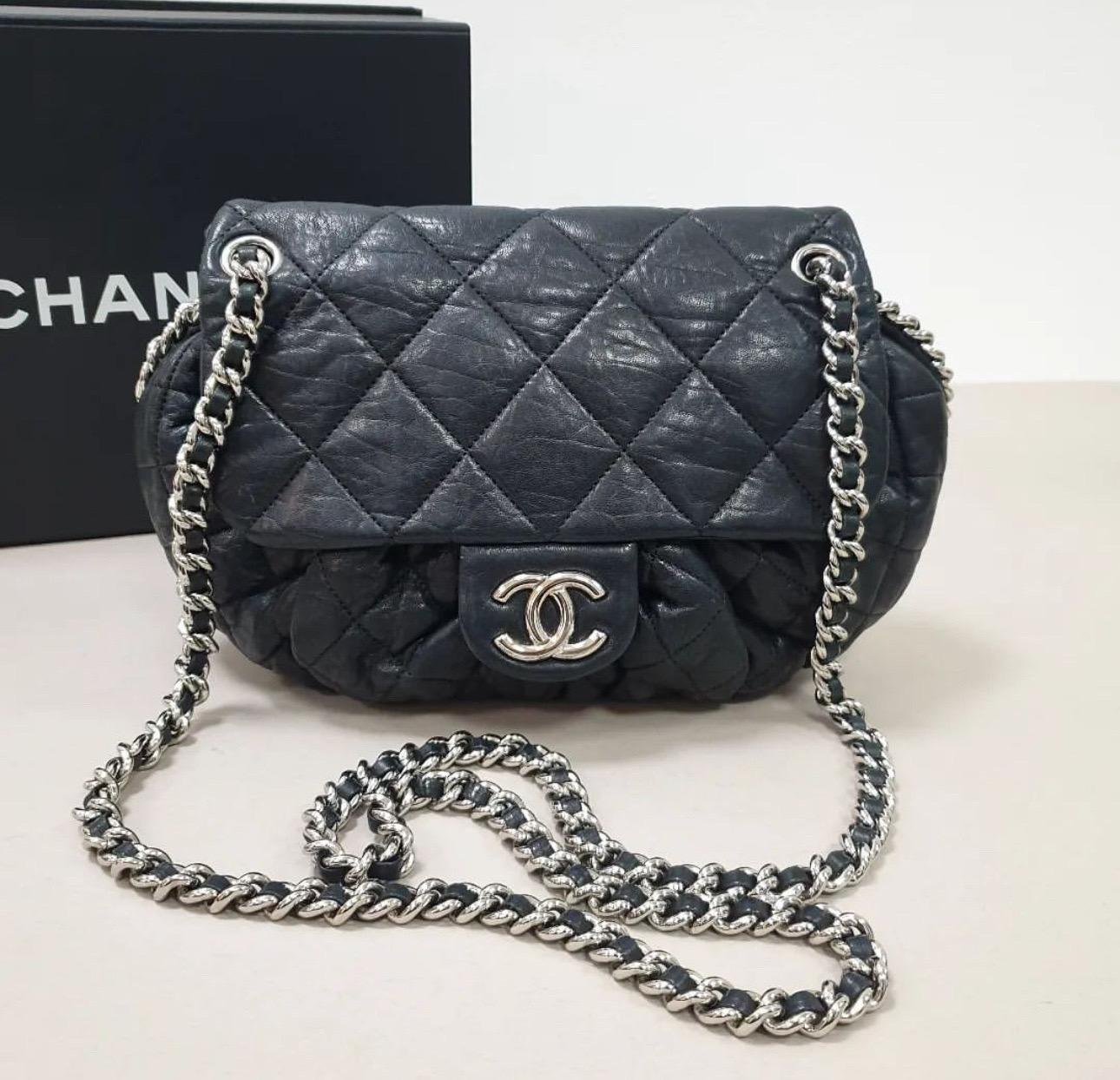 

        Chanel Messenger Bag
        From the Cruise 2012 Collection by Karl Lagerfeld
        Black Lambskin
        Silver-Tone Hardware
        Chain-Link Shoulder Strap
        Grosgrain Lining & Single Interior Pocket
        Flap Closure at
