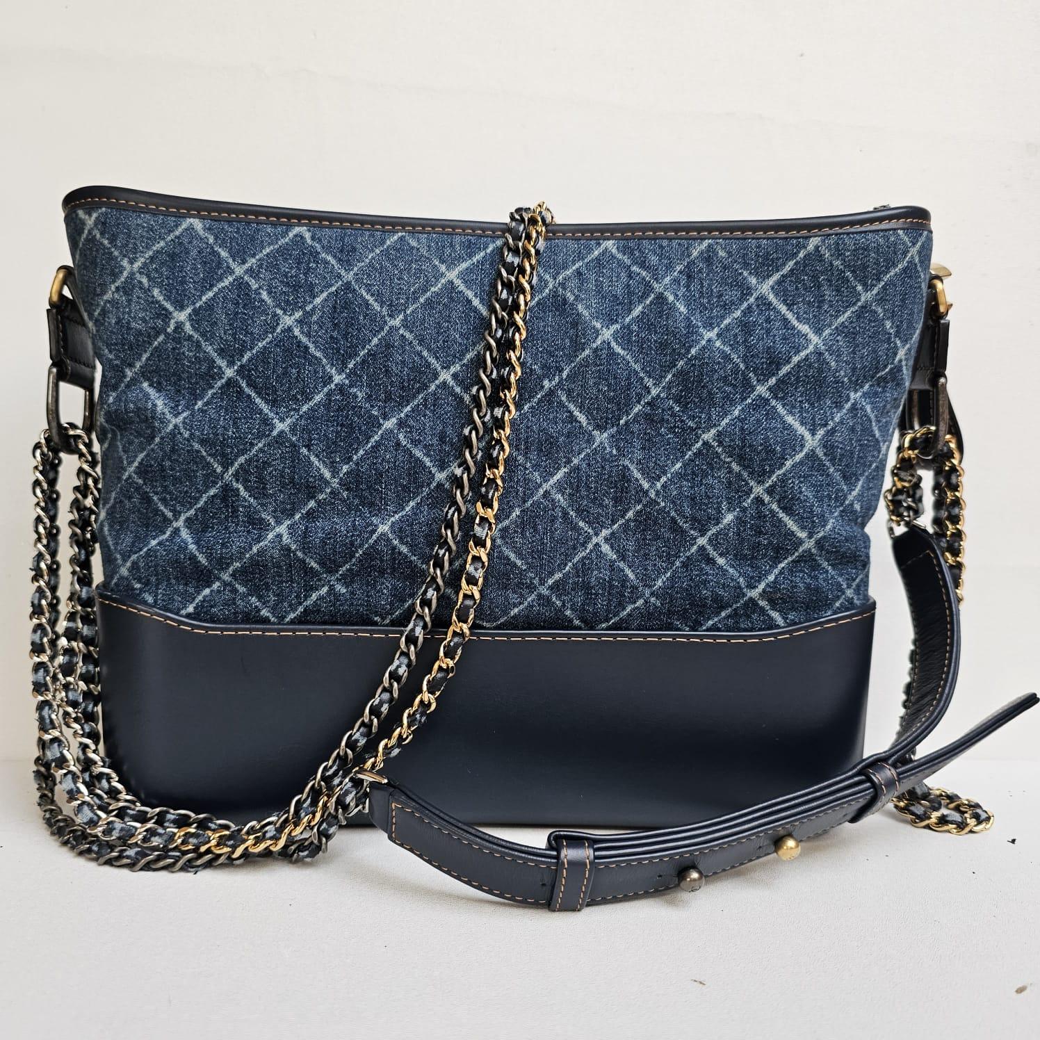 Classic gabrielle bag in denim quilt. Large size. Overall still in great condition, with slight peeling on the leather coating of the interwoven strap. Comes with holo, card and dust bag. Series #25.